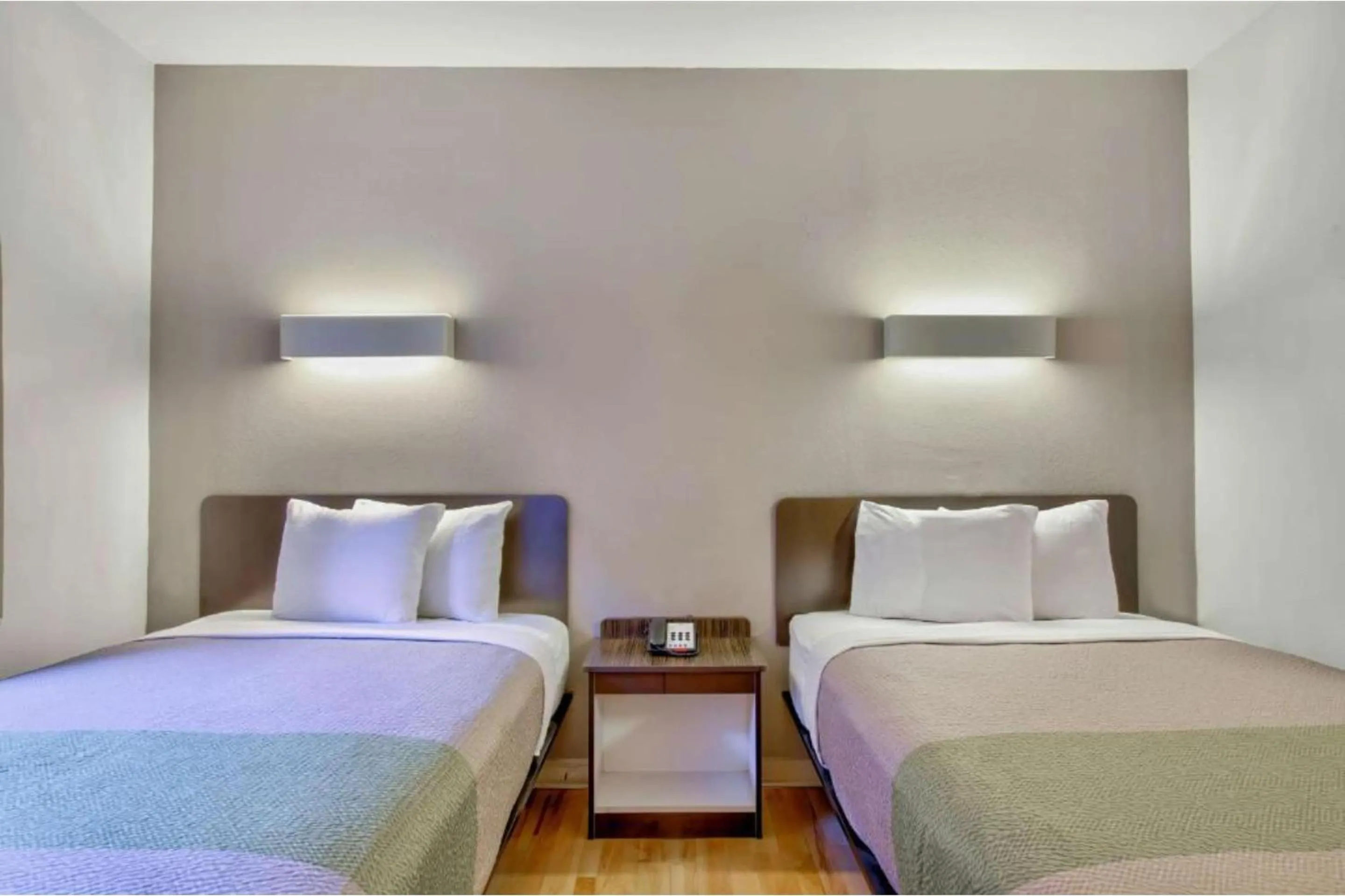 Bedroom, Bed in OYO Townhouse Beaumont Medical Center Area