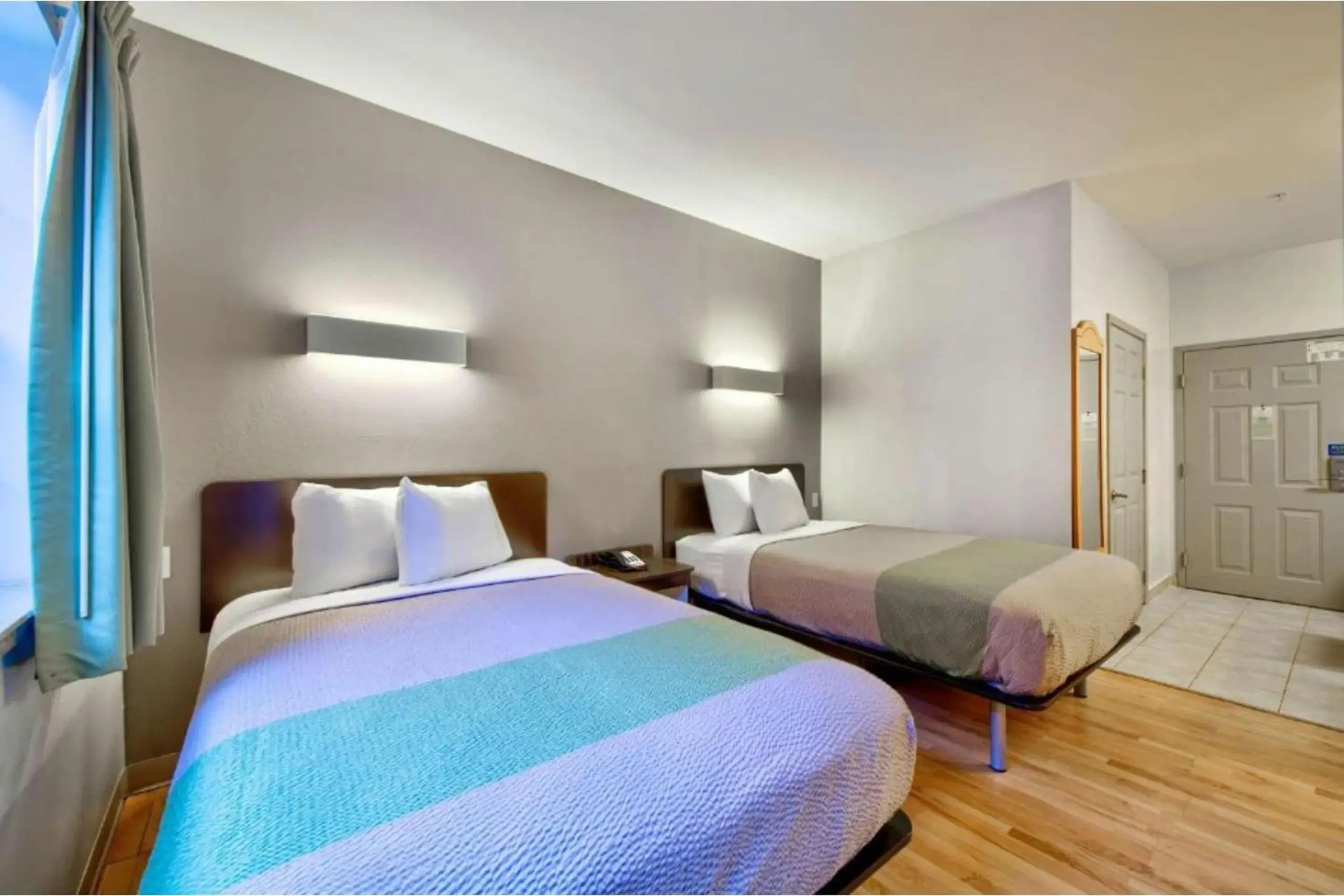 Bedroom, Bed in OYO Townhouse Beaumont Medical Center Area Bedroom, Bed in OYO Townhouse Beaumont Medical Center Area