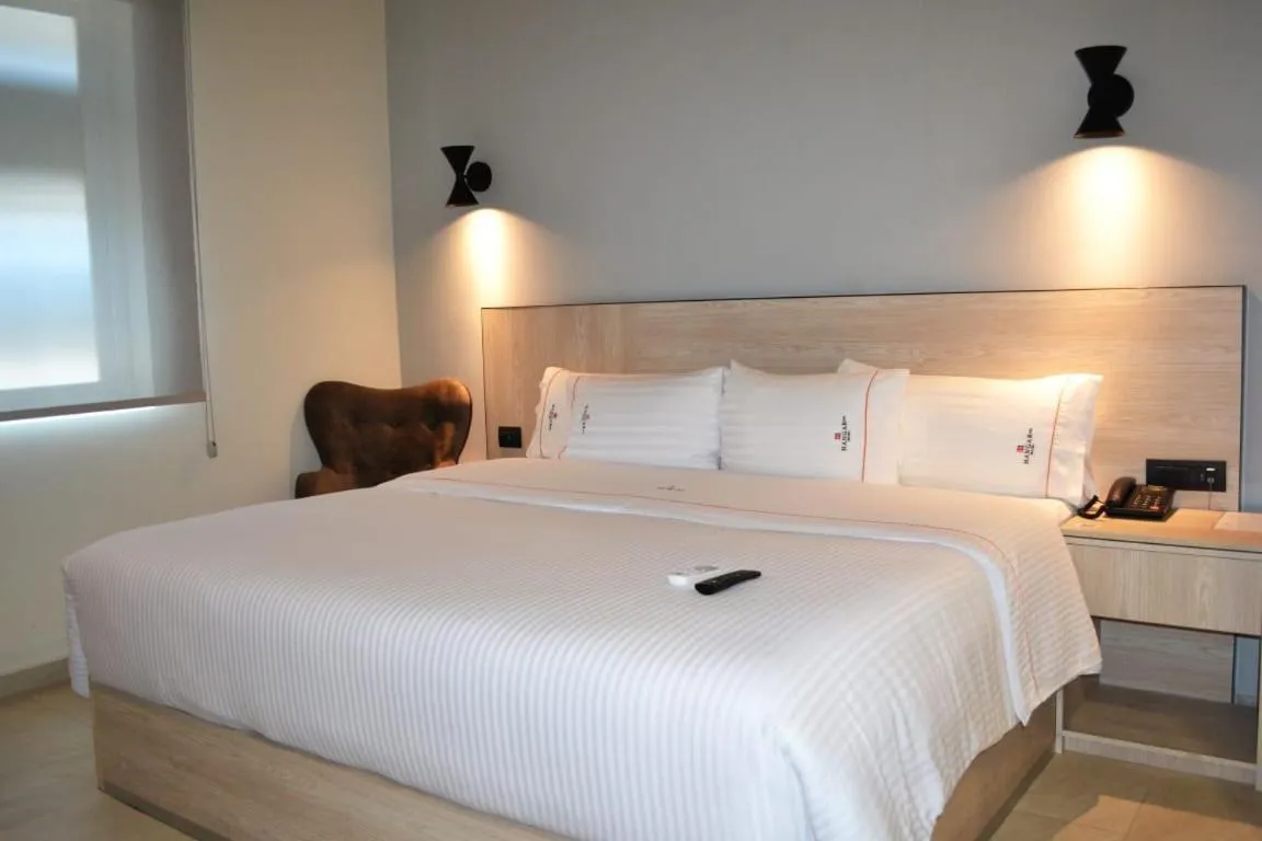 Bed in Hangar Inn Guadalajara Aeropuerto