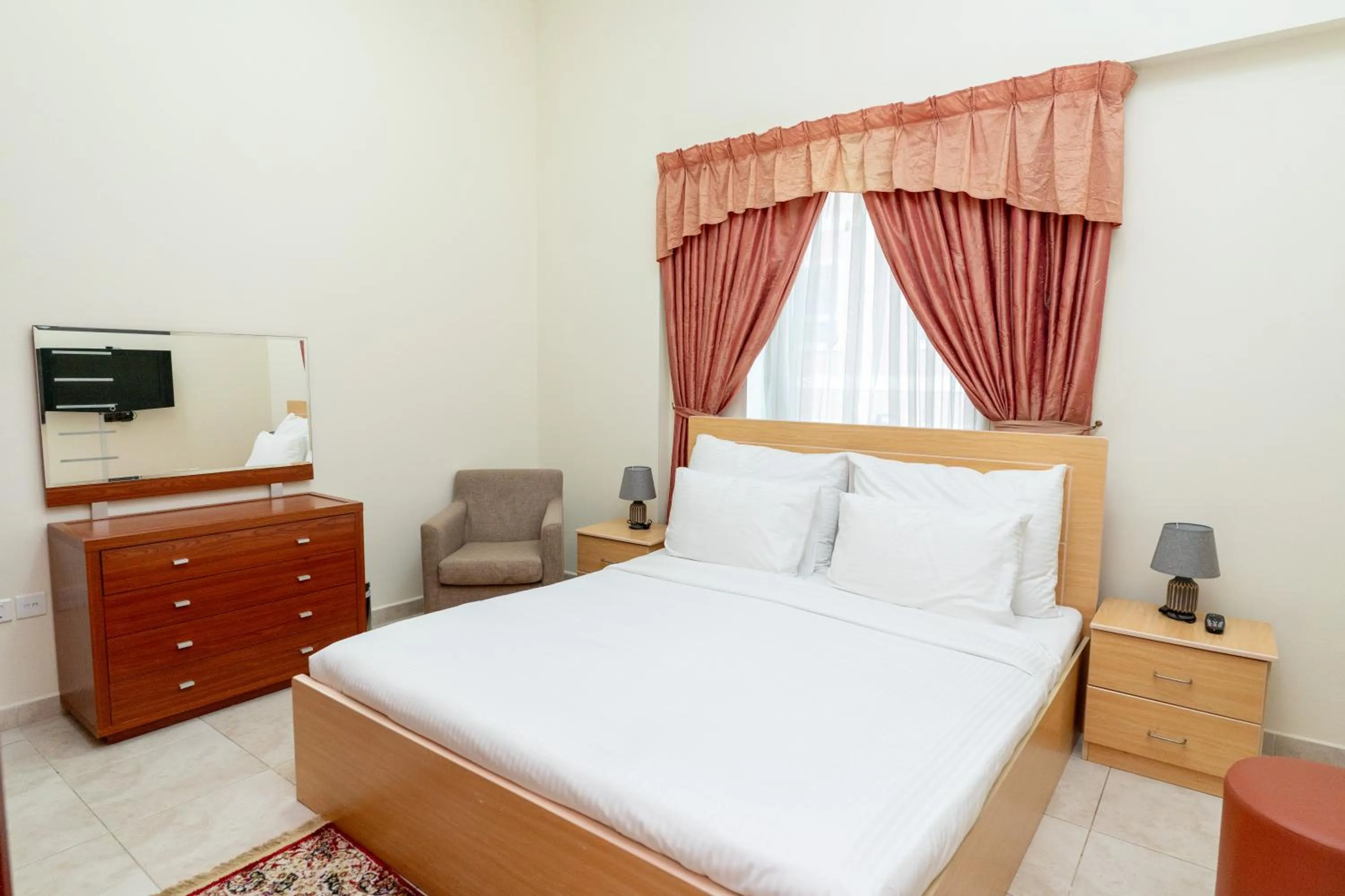 Bed in Al Raya Hotel Apartments
