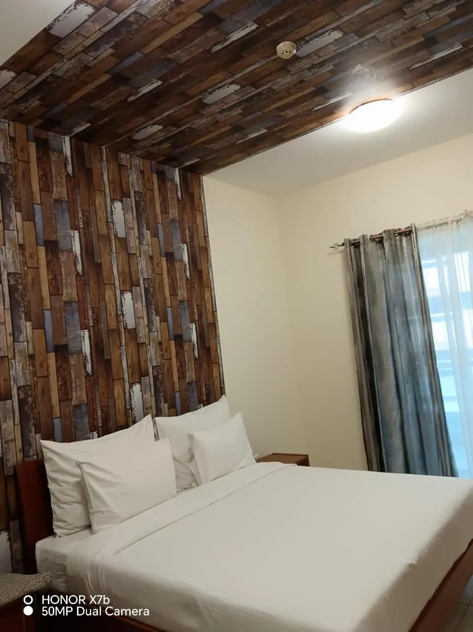 Bed in Al Raya Hotel Apartments