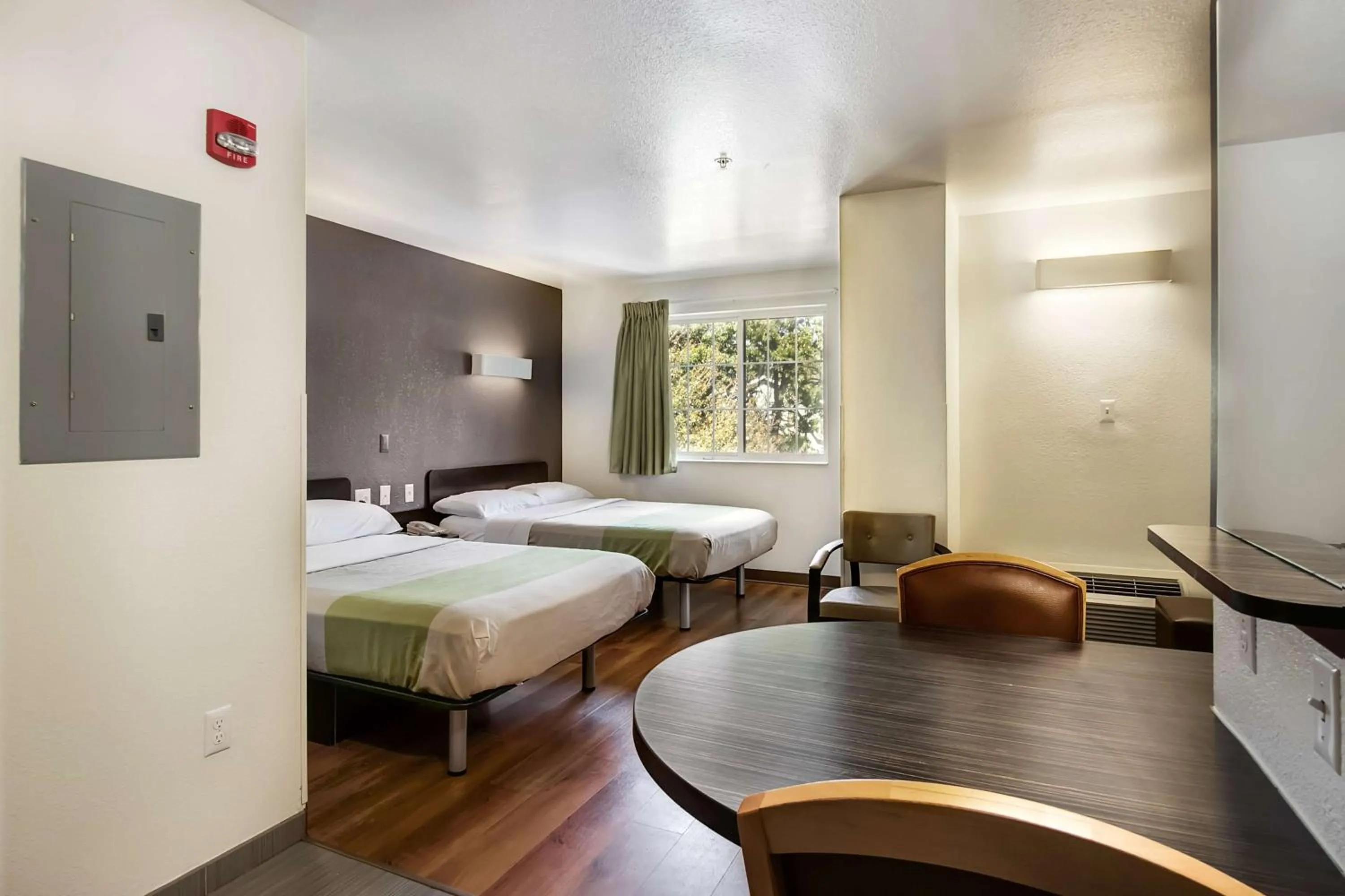 Seating area, Bed in Studio 6-East Brunswick, NJ - NYC Area