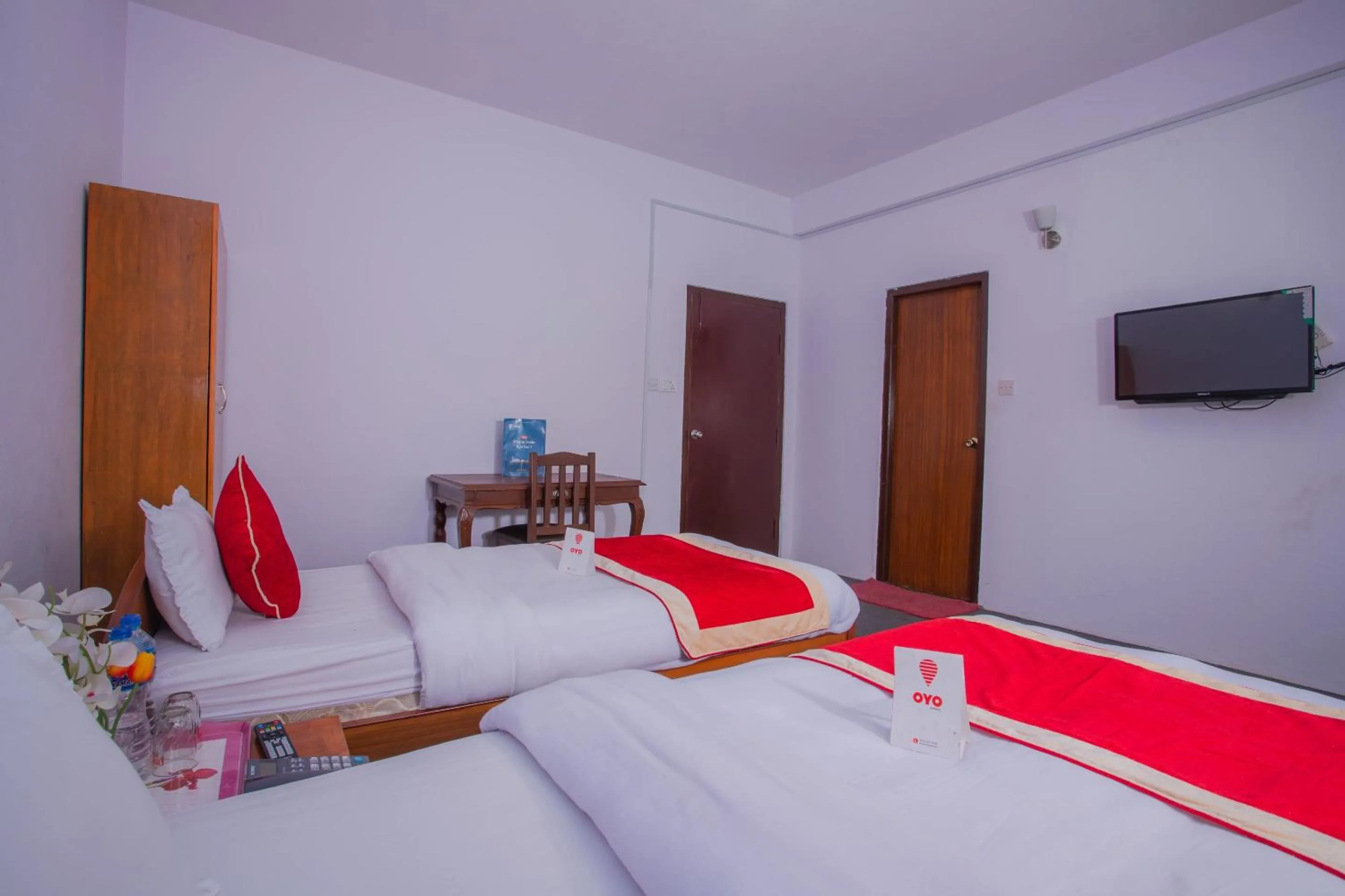 Bedroom, Bed in OYO 135 Lost Garden Apartment and Guest House