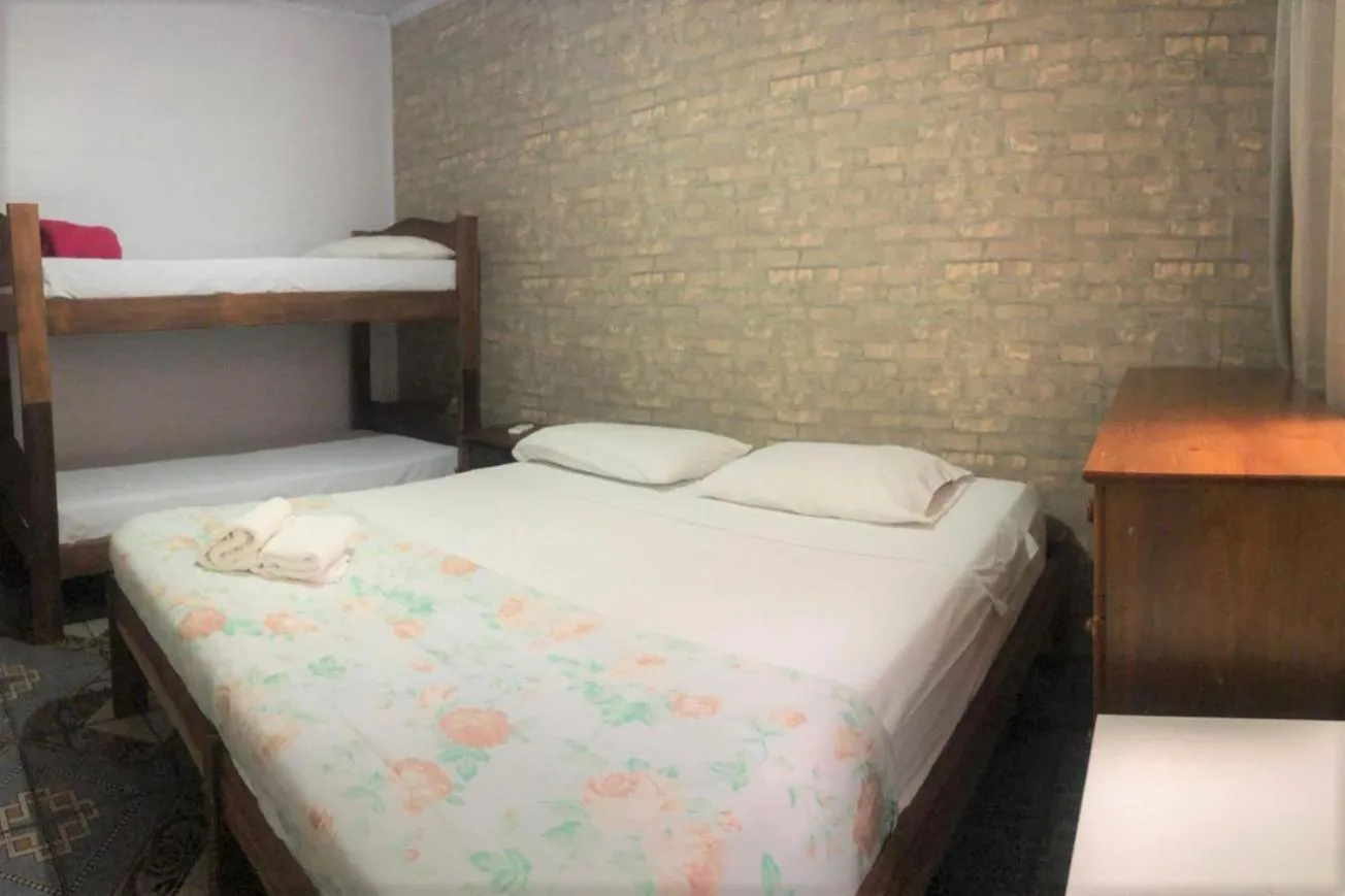 Bed in Geko Pousada Paraty