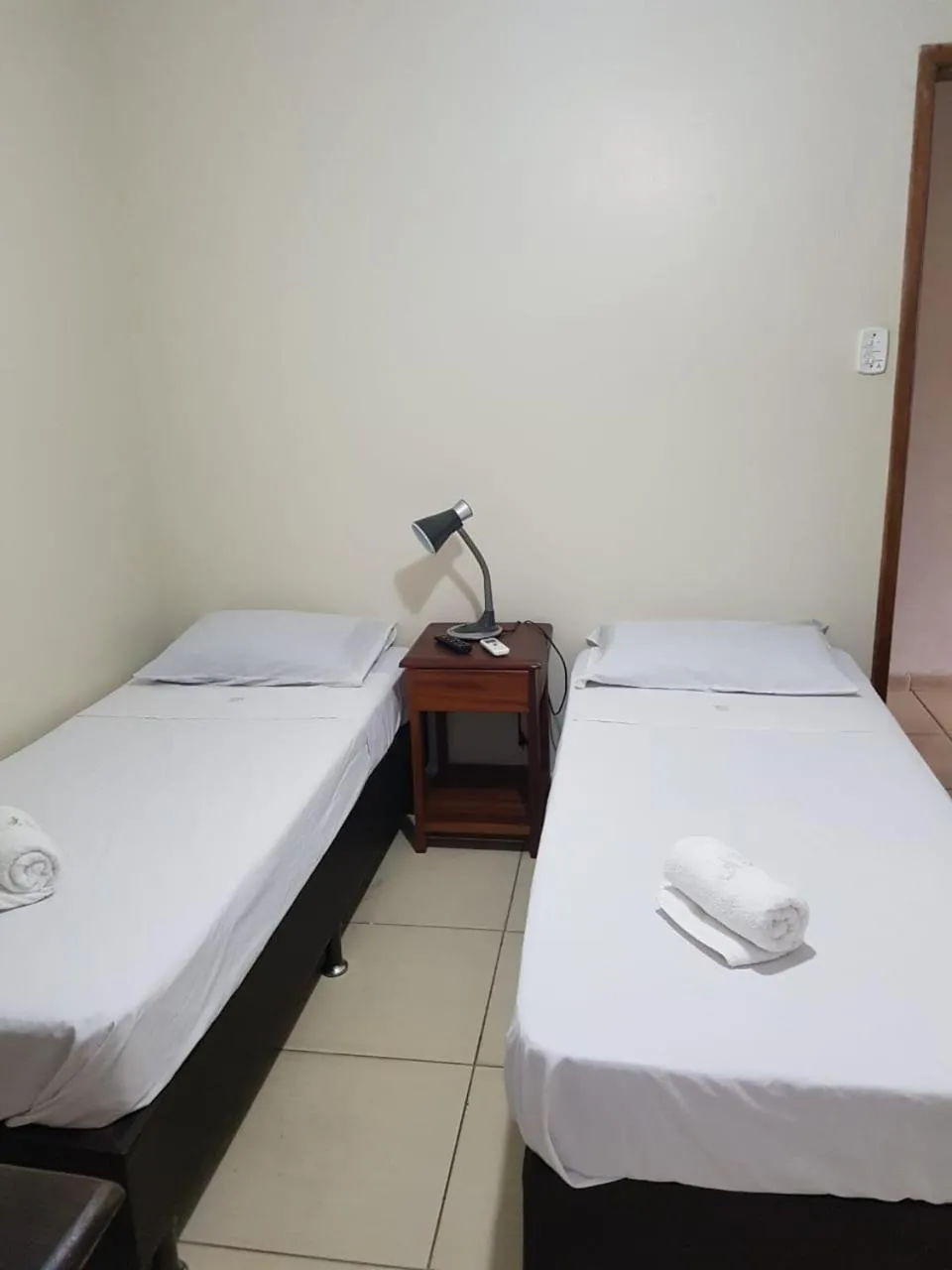 Inner courtyard view, Bed in Geko Pousada Paraty