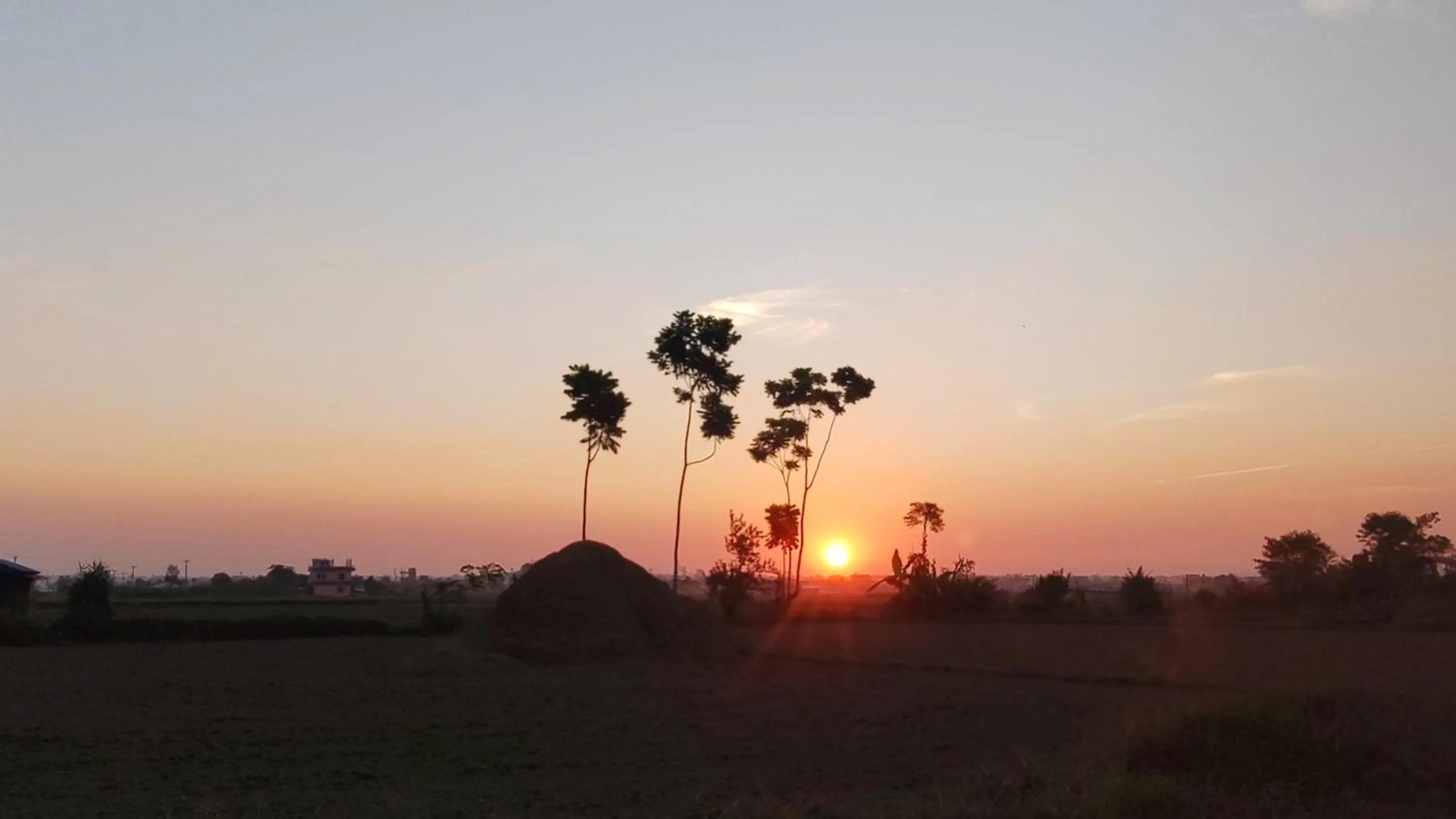 Sunset in Hotel Rhino Land-Sauraha Family Home