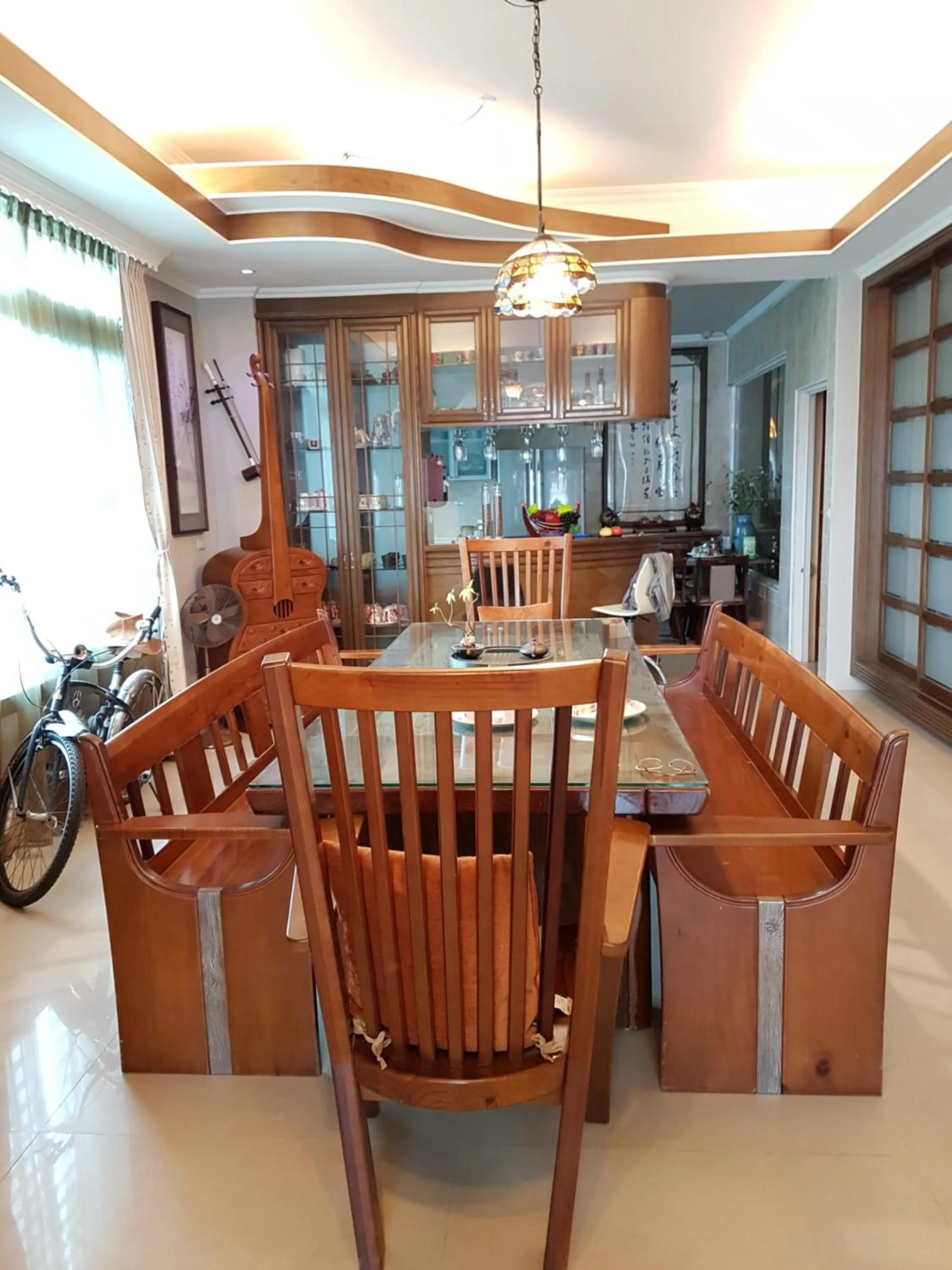 Communal lounge/ TV room in Emaly Homestay