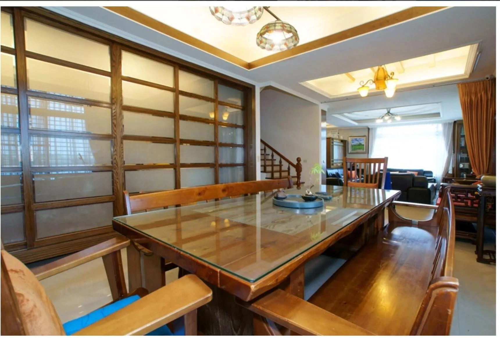 Communal lounge/ TV room in Emaly Homestay