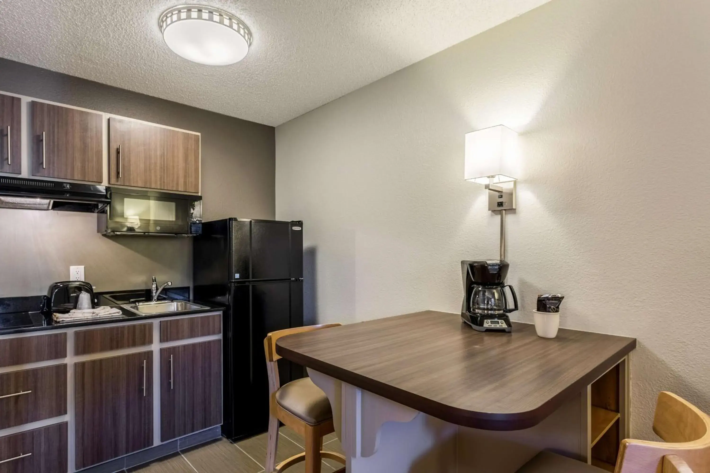 Kitchen or kitchenette, Kitchen/Kitchenette in Studio 6-Albuquerque, NM - North