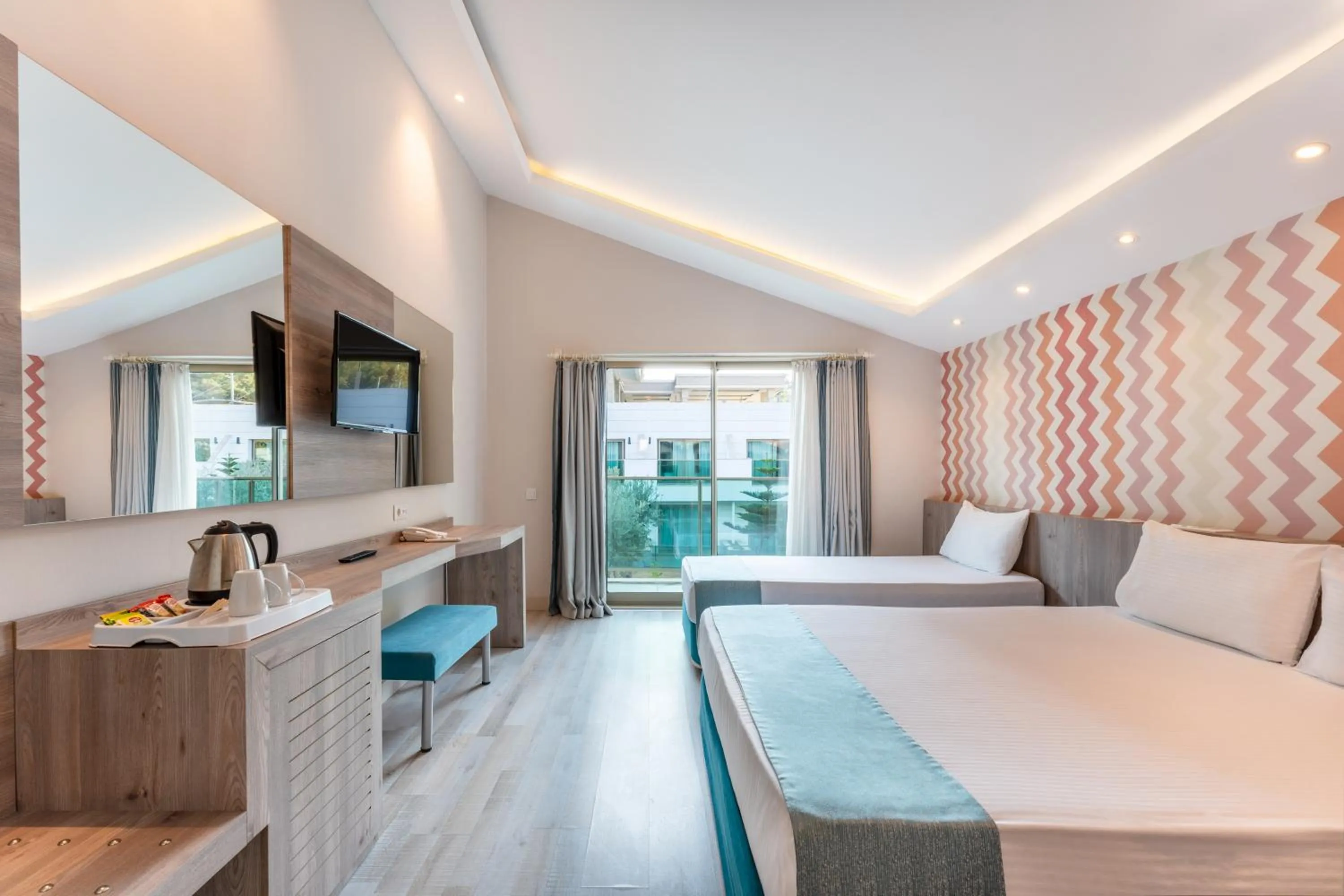 Bed in Dosinia Luxury Resort-Ultra All Inclusive