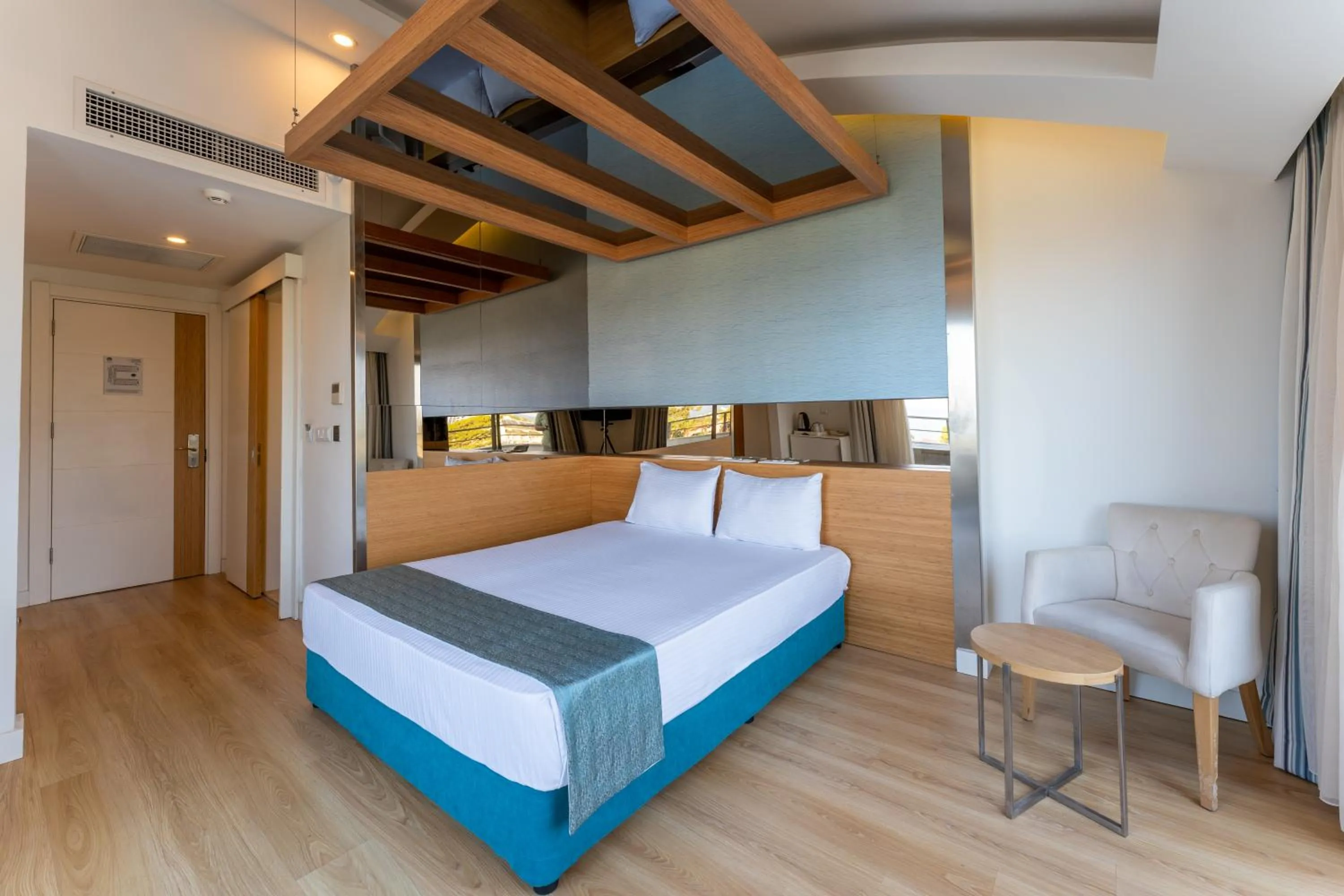 Bed in Dosinia Luxury Resort-Ultra All Inclusive