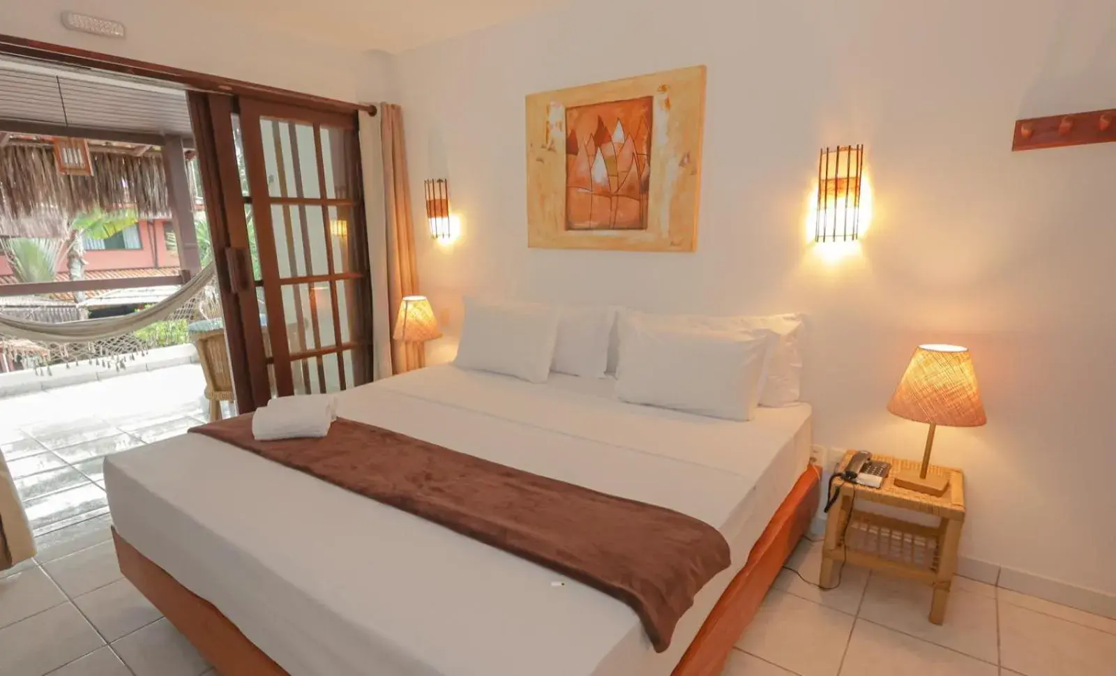 Family Room with Balcony and Pool View in Pousada Saudosa Maloca Family Room with Balcony and Pool View in Pousada Saudosa Maloca