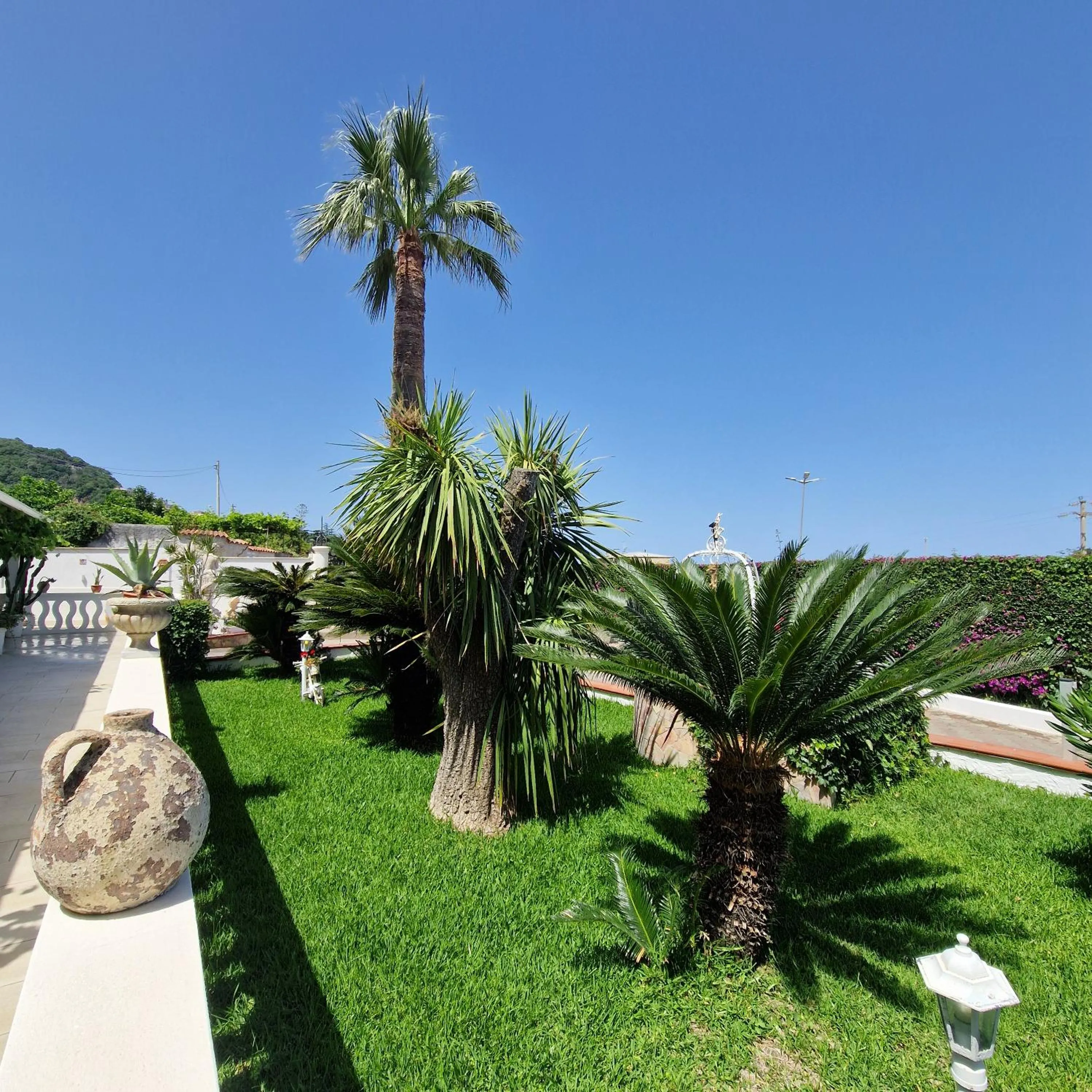 Garden in SANTA VENERE Apartments "PARCHEGGIO interno MOTO-AUTO" Ricarica auto Elettriche