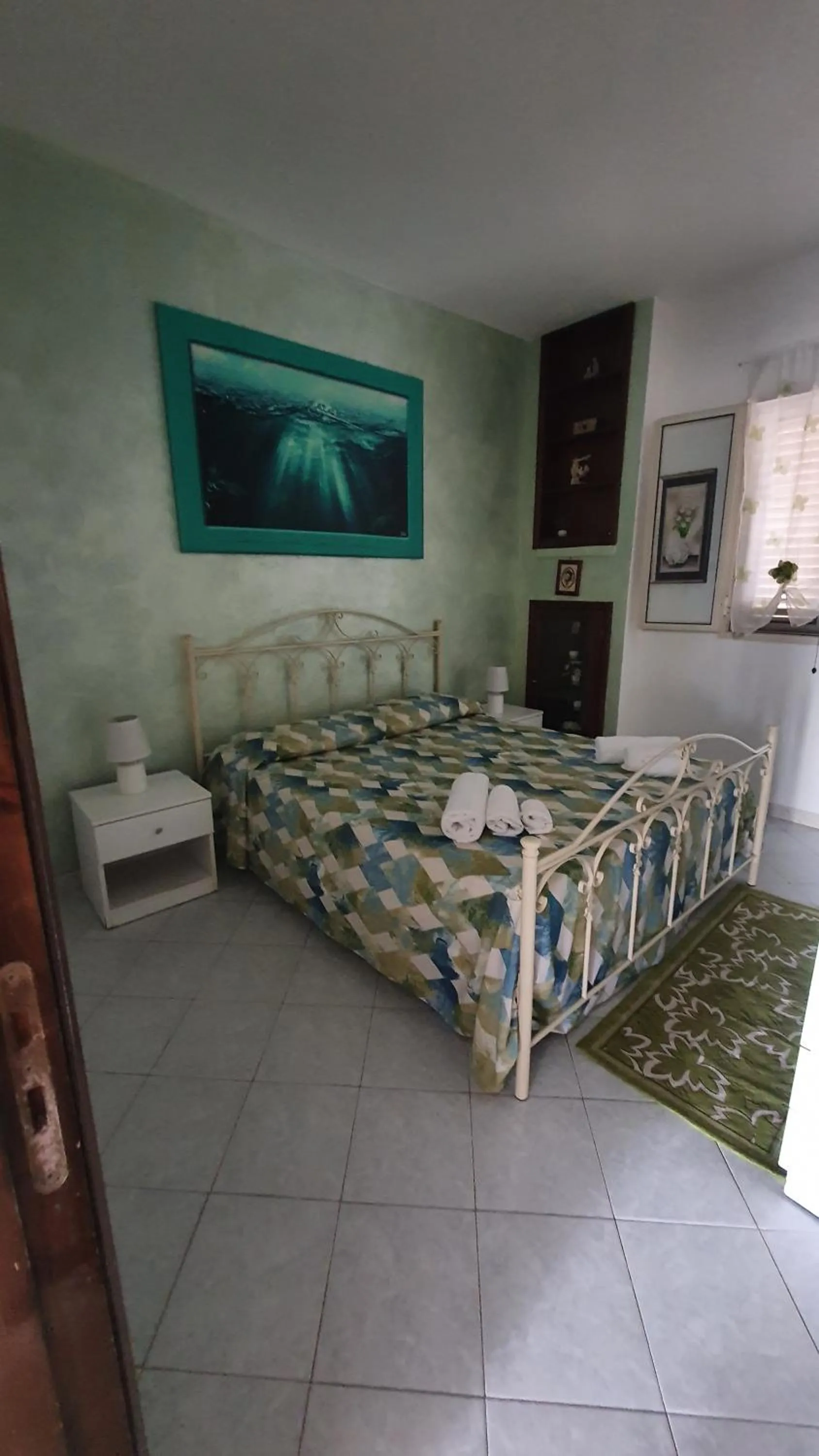 Bed in SANTA VENERE Apartments "PARCHEGGIO interno MOTO-AUTO" Ricarica auto Elettriche