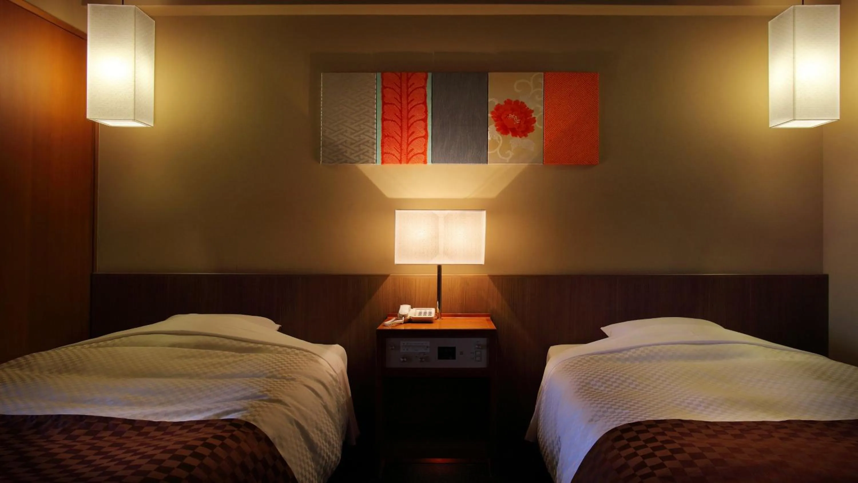 Bed in Aki Grand Hotel & Spa