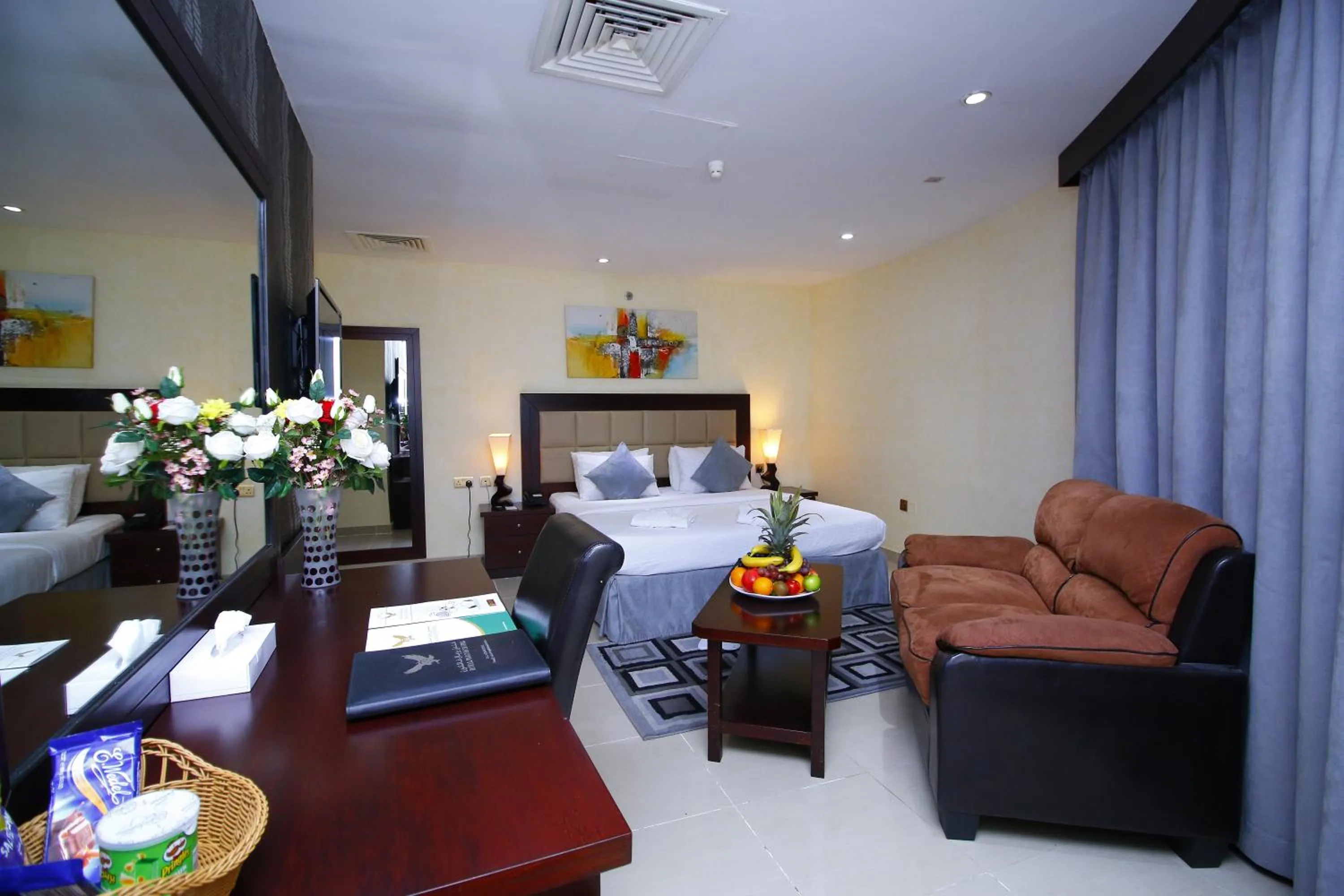 Living room, Bed in Royal Falcon Hotel