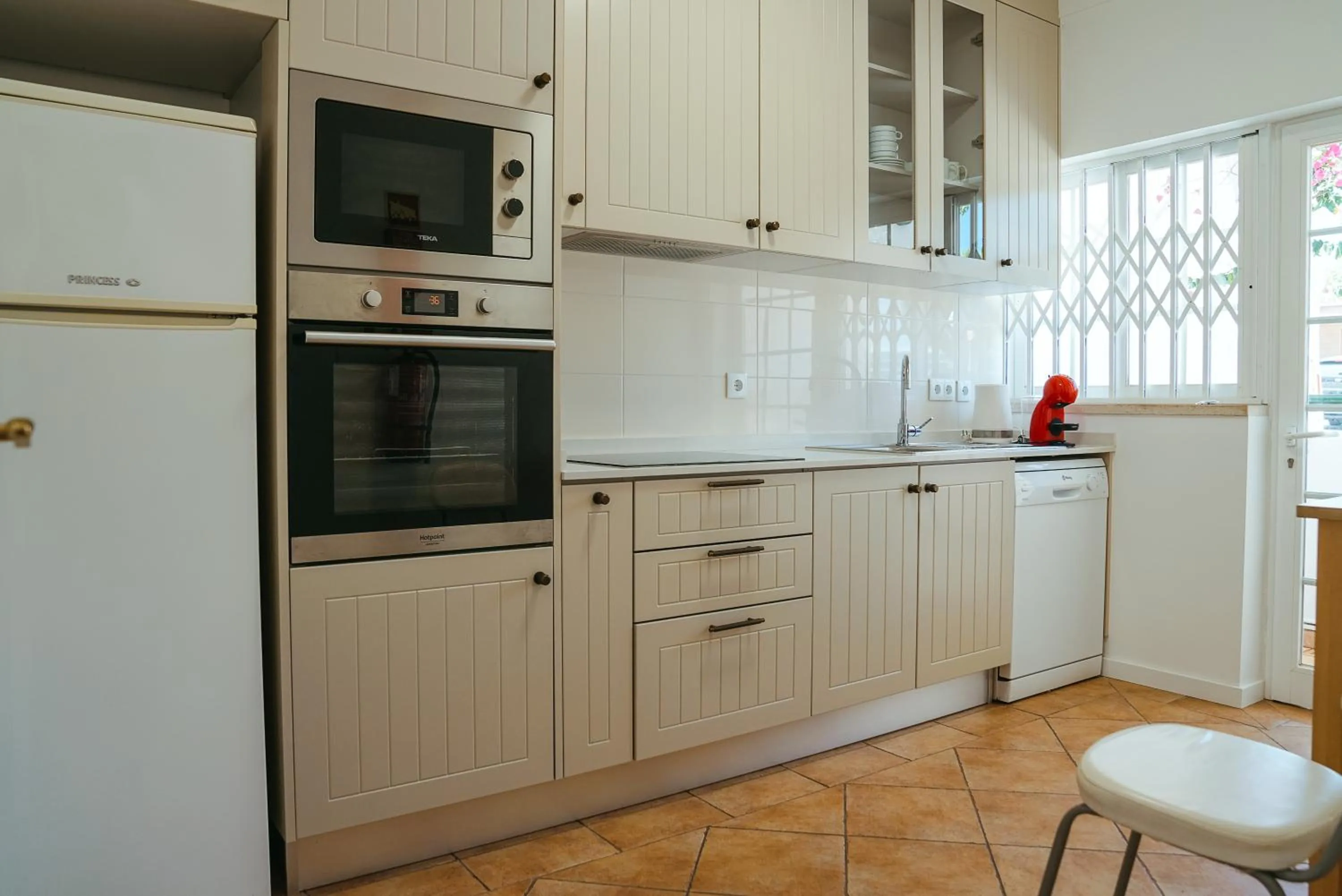 Kitchen or kitchenette in Moradias Villas Rufino