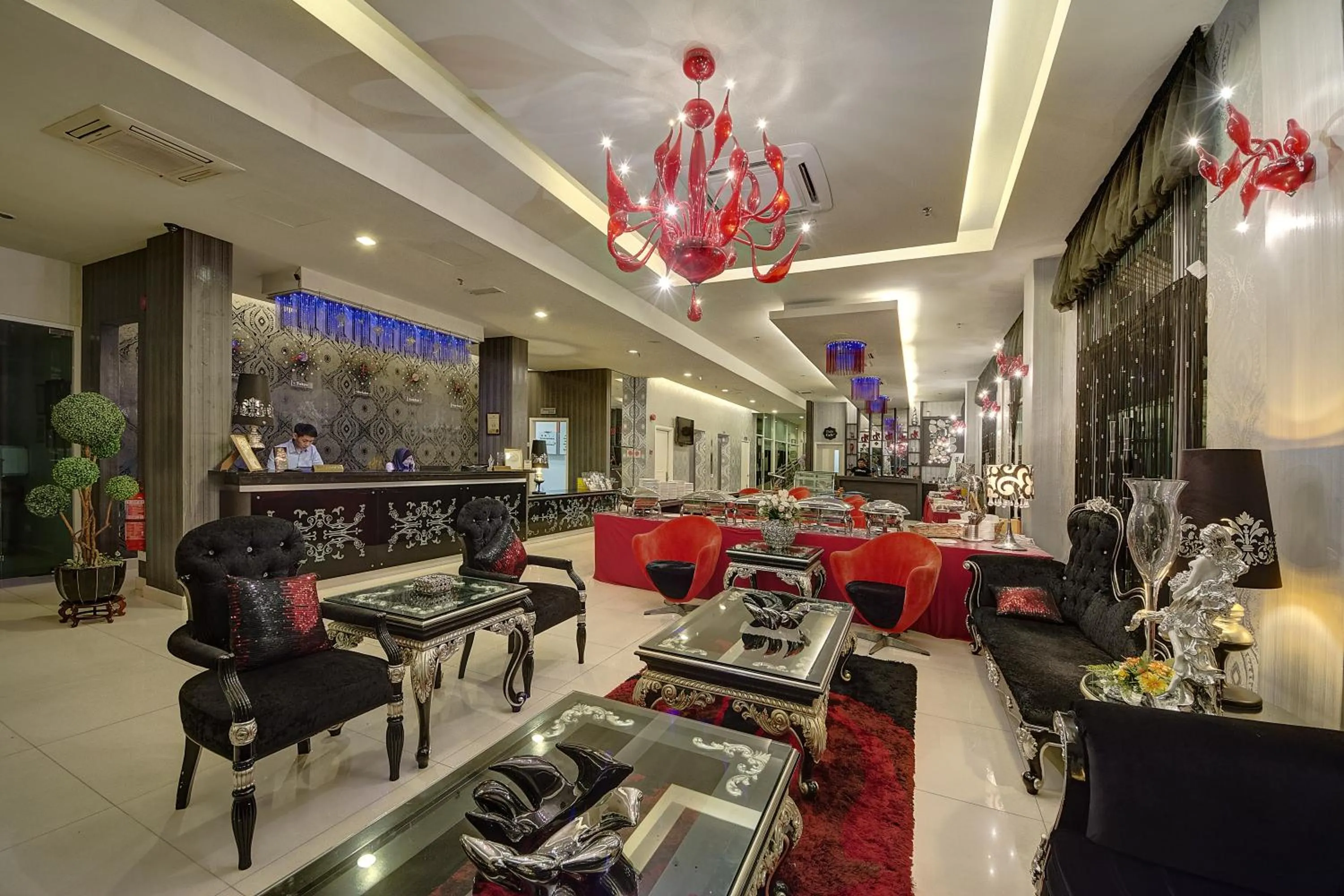 Lobby or reception in Arenaa Deluxe Hotel