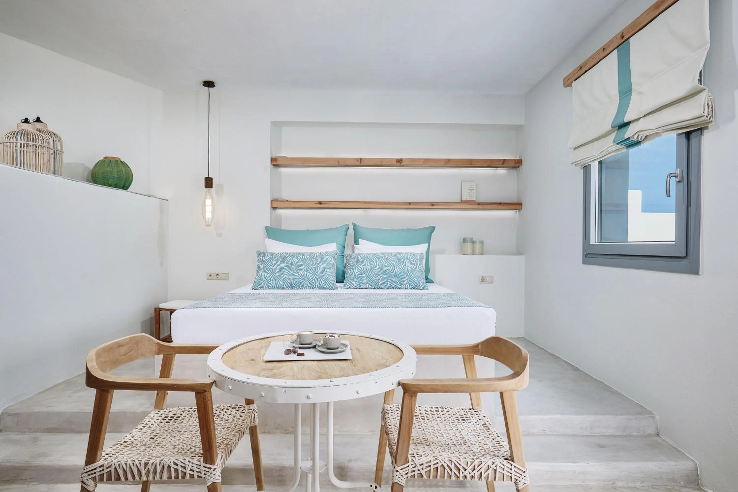 Seating area, Bed in Chrysalis Boutique - Adults Only