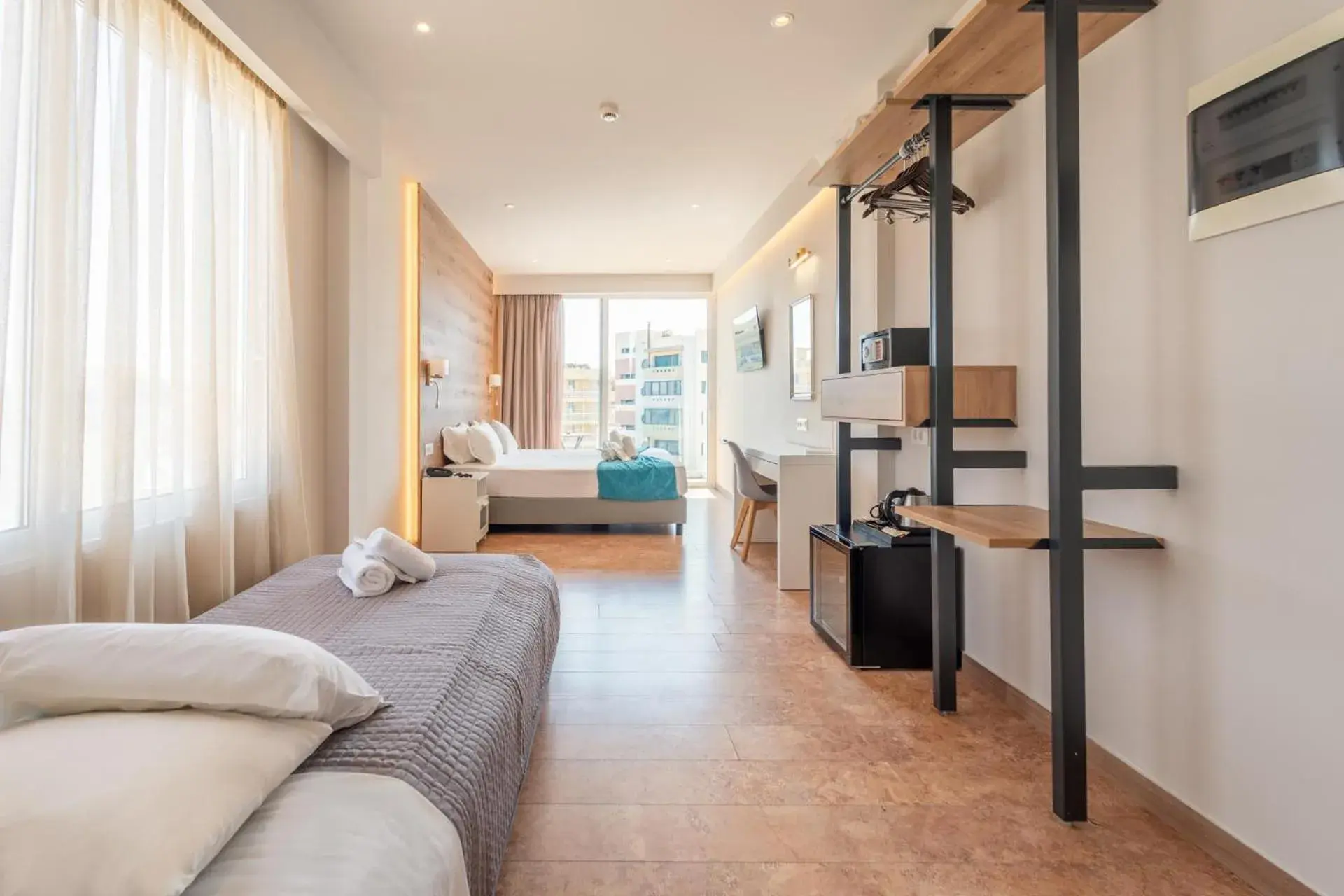 One Bedroom Triple Family Room in Arte Hotel One Bedroom Triple Family Room in Arte Hotel