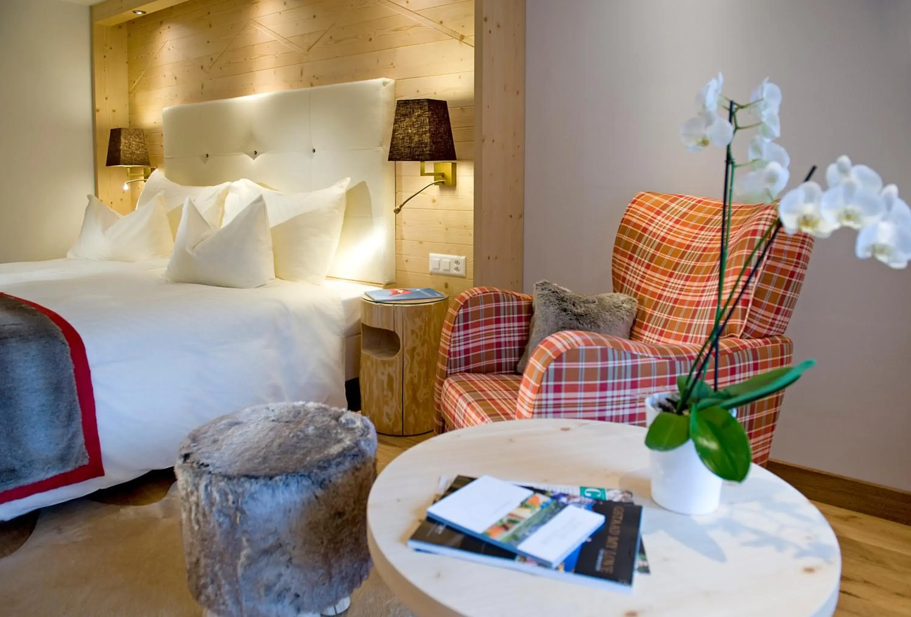 Photo of the whole room, Bed in GOLFHOTEL Les Hauts de Gstaad & SPA Photo of the whole room, Bed in GOLFHOTEL Les Hauts de Gstaad & SPA