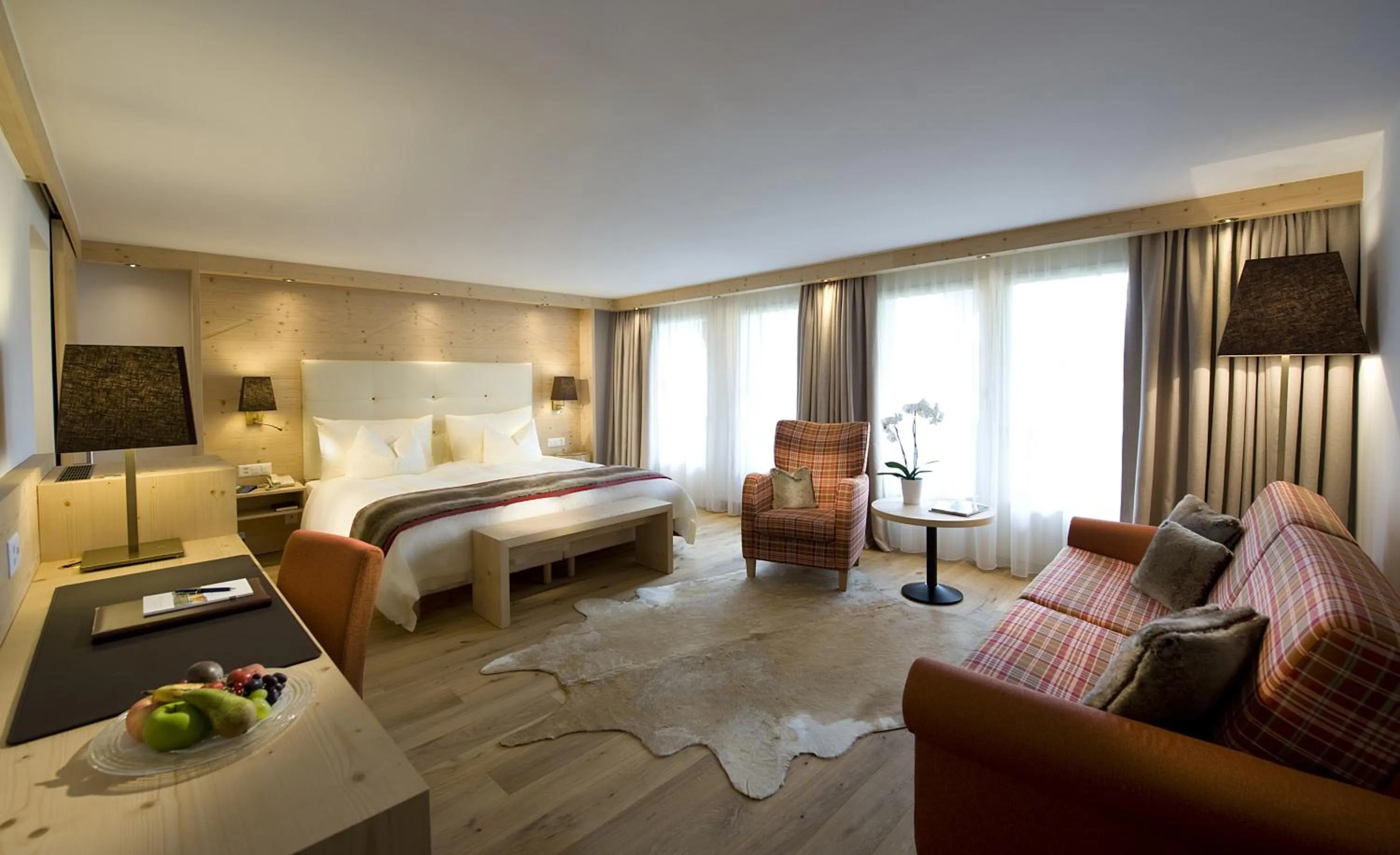 Bedroom, Bed in GOLFHOTEL Les Hauts de Gstaad & SPA