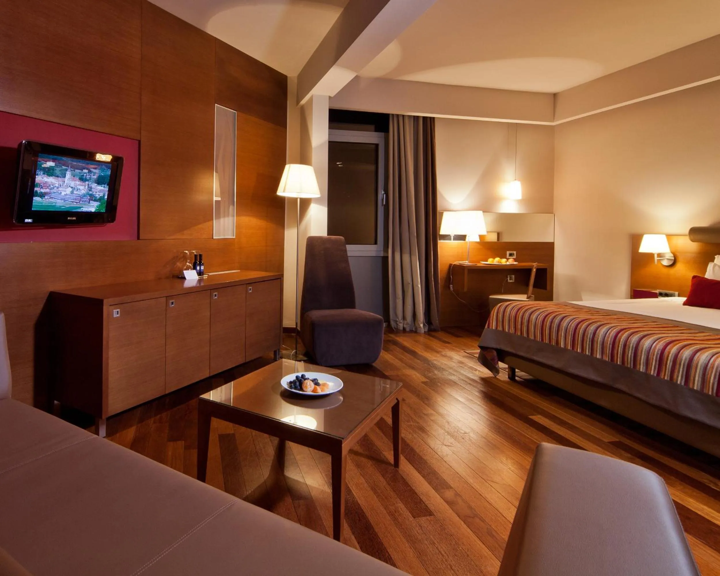 Seating area, Bed in Hotel Kaj