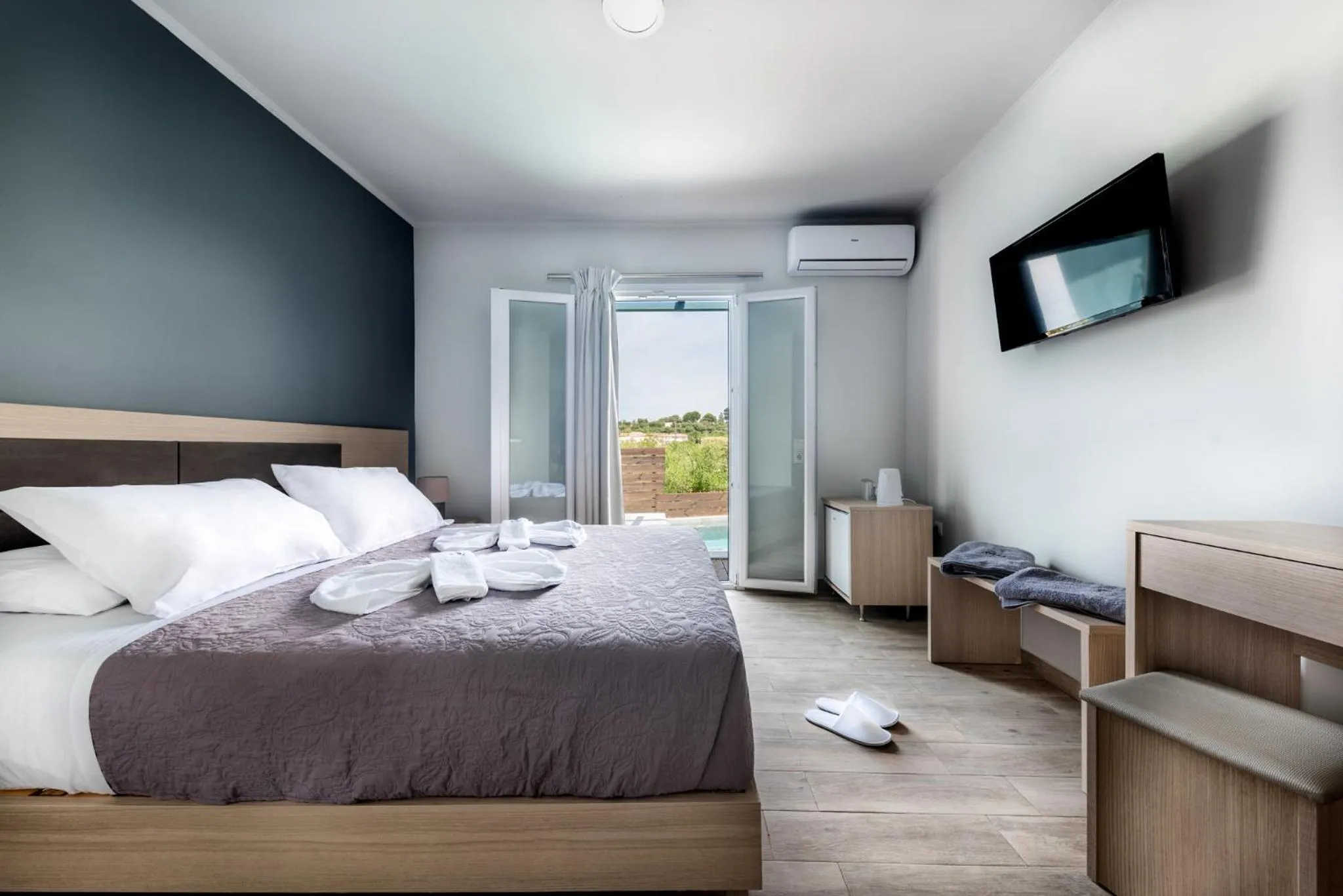 Communal lounge/ TV room in Zante Calinica Hotel