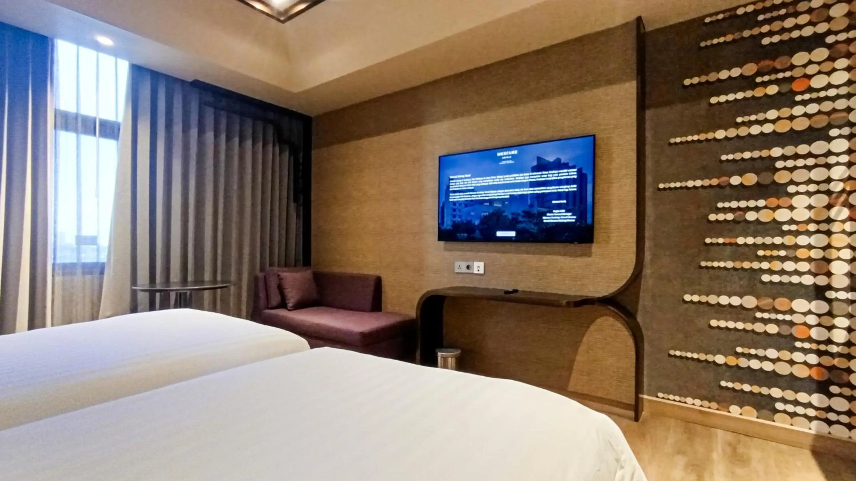 TV and multimedia, Bed in Mercure Surabaya Grand Mirama