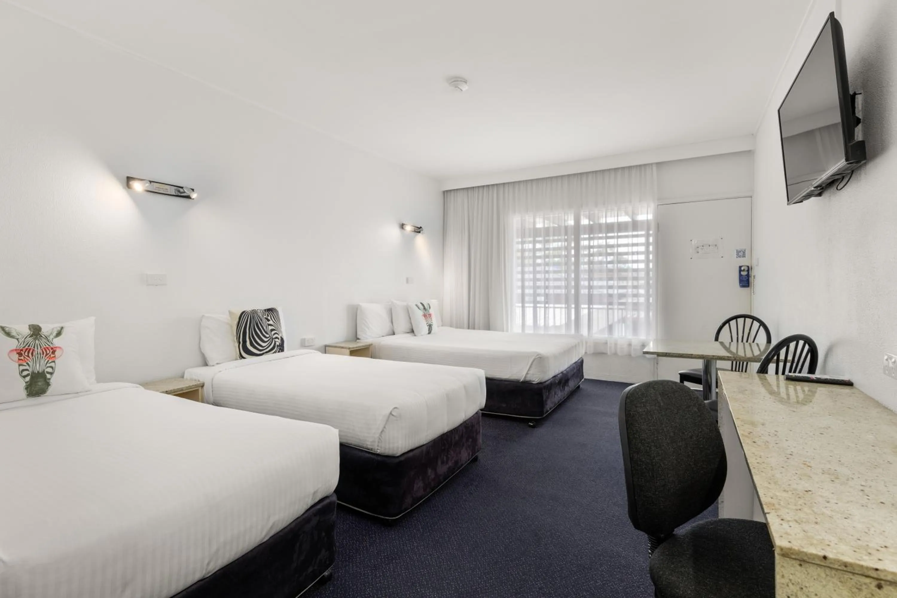 Family, Bed in Zebra Motel