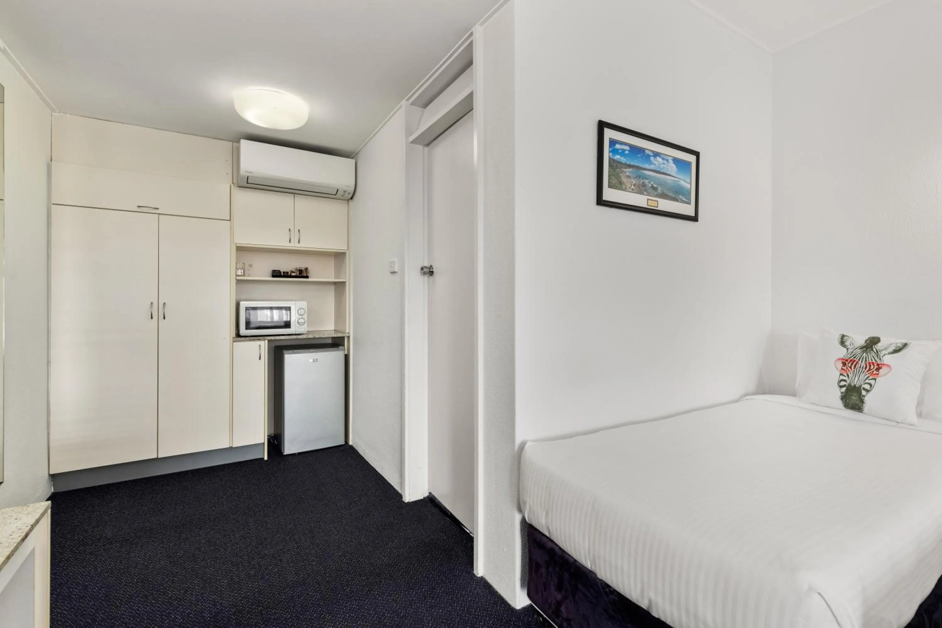 Family, Bed in Zebra Motel