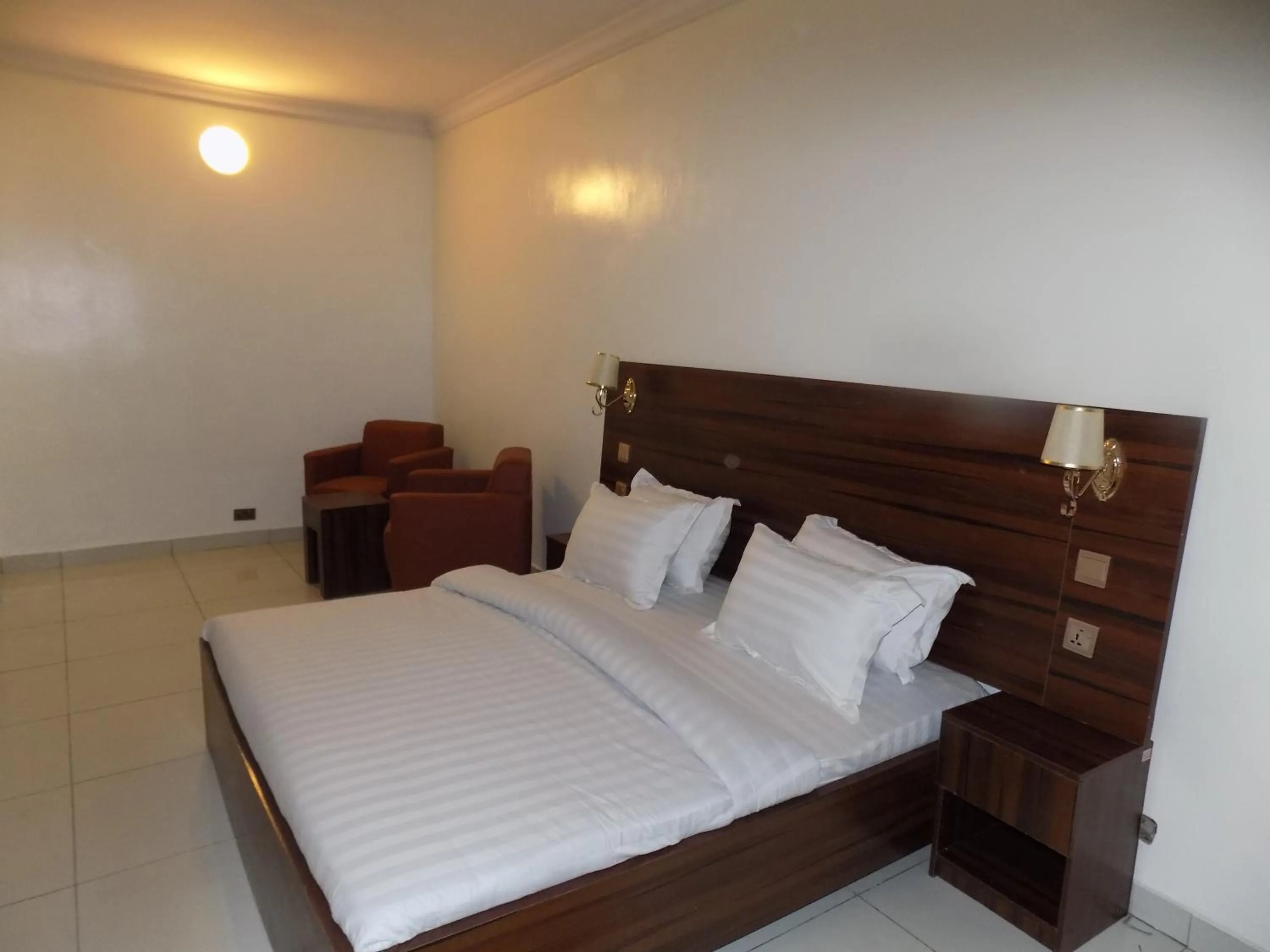 Bedroom, Bed in Posh Hotel and Suites Victoria Island