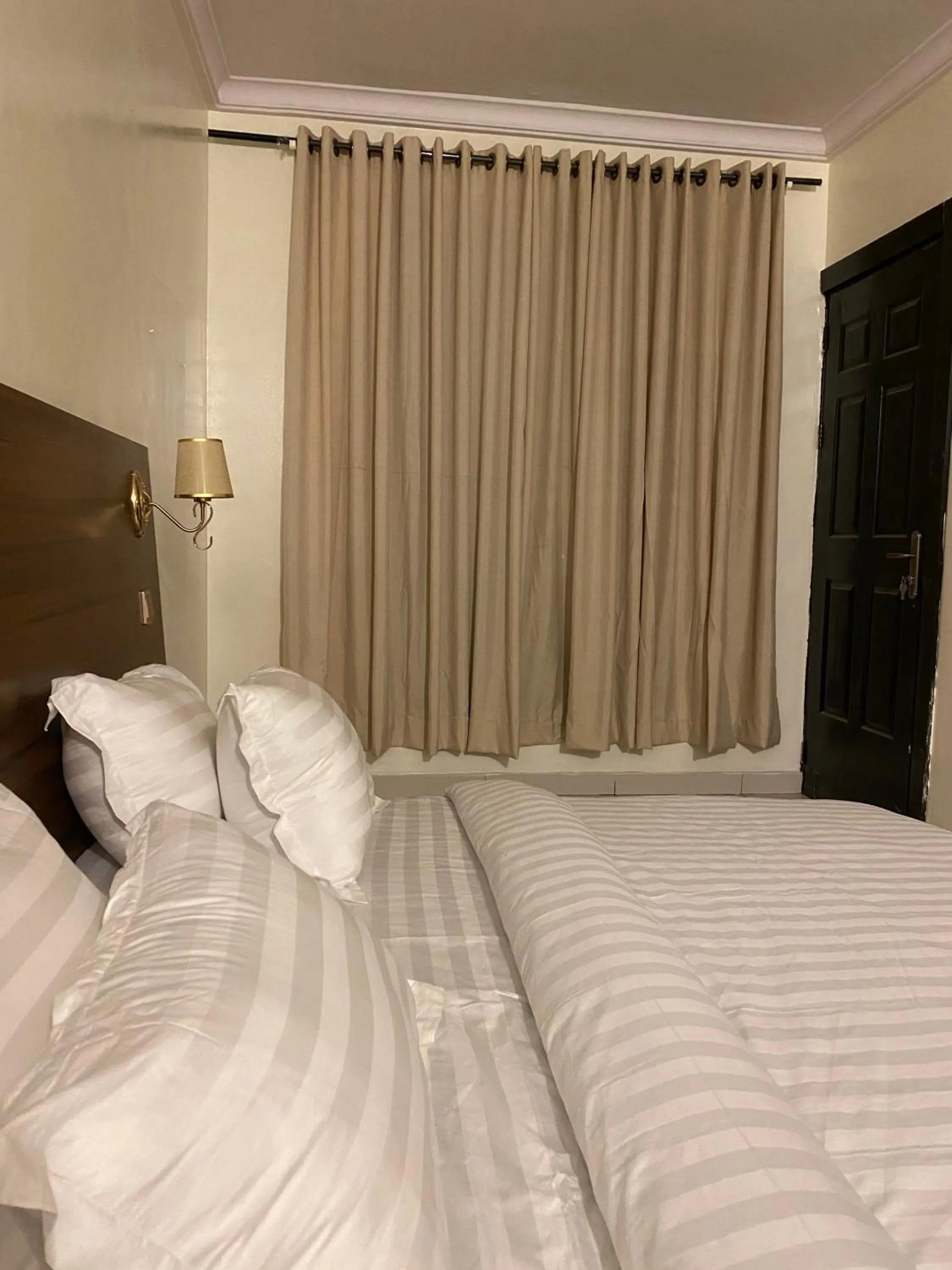 Bedroom, Bed in Posh Hotel and Suites Victoria Island