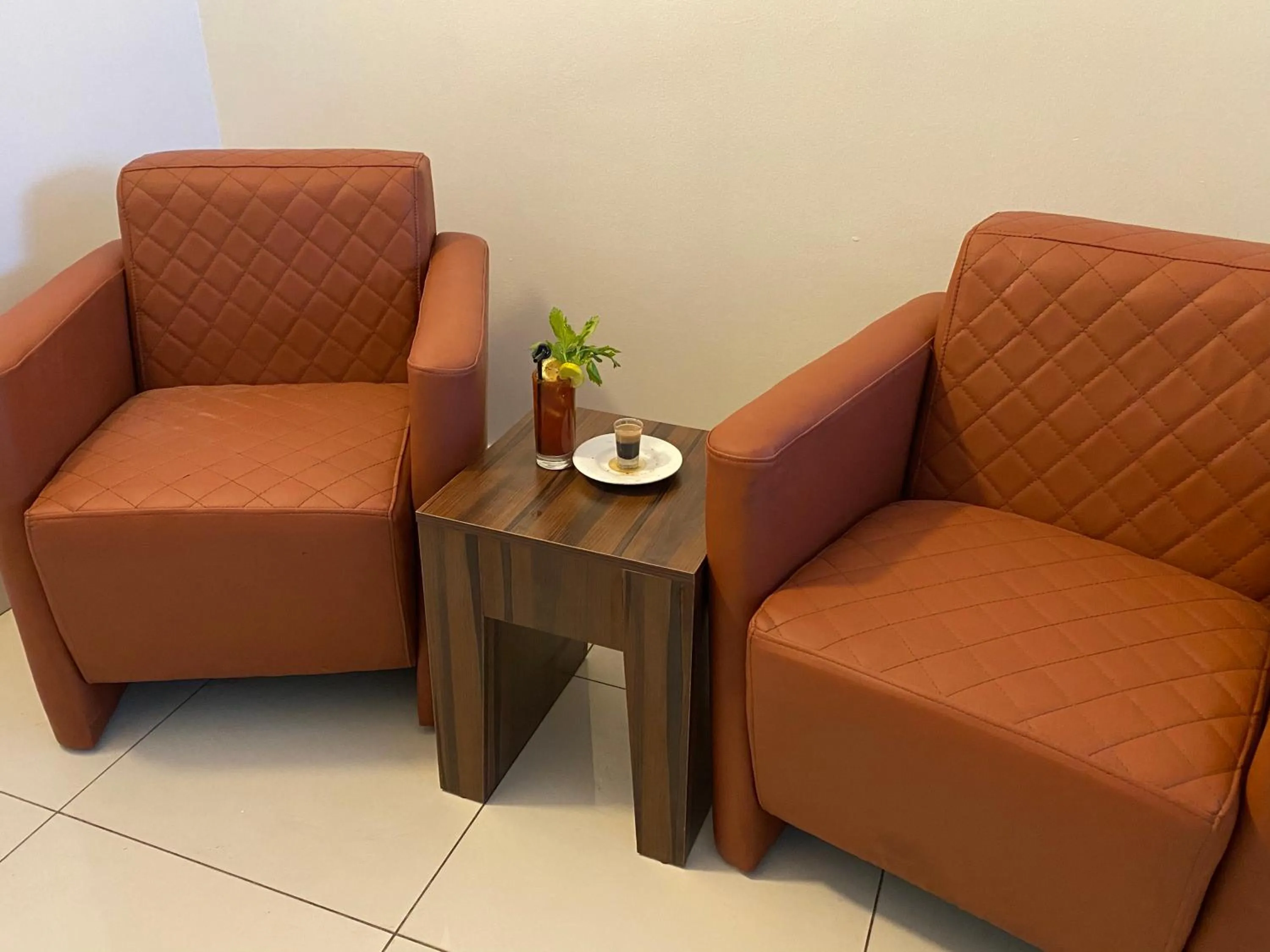 Seating area in Posh Hotel and Suites Victoria Island