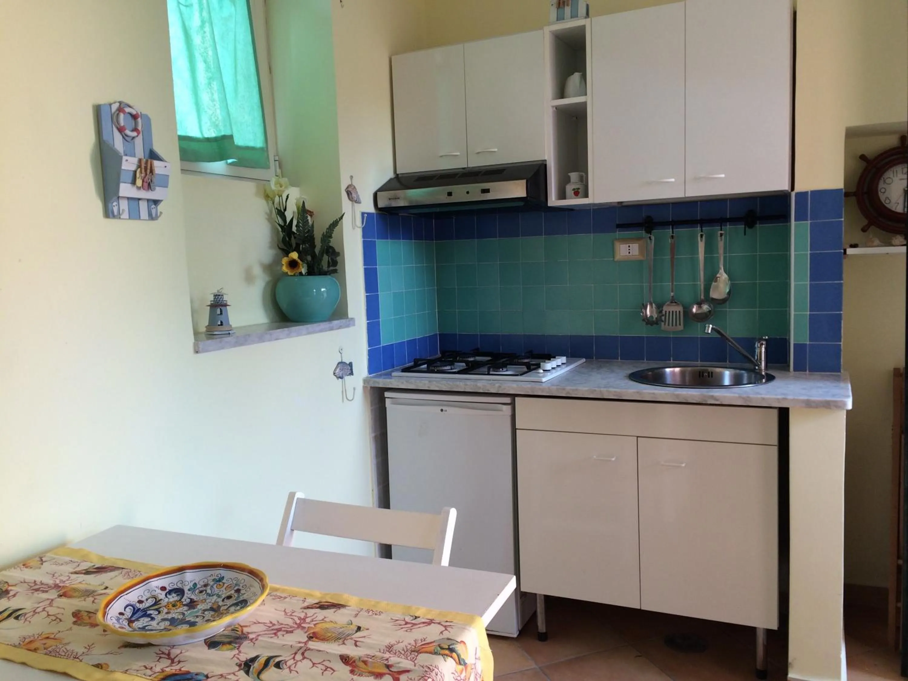 Kitchen or kitchenette in Il Borghetto Apartments & Rooms
