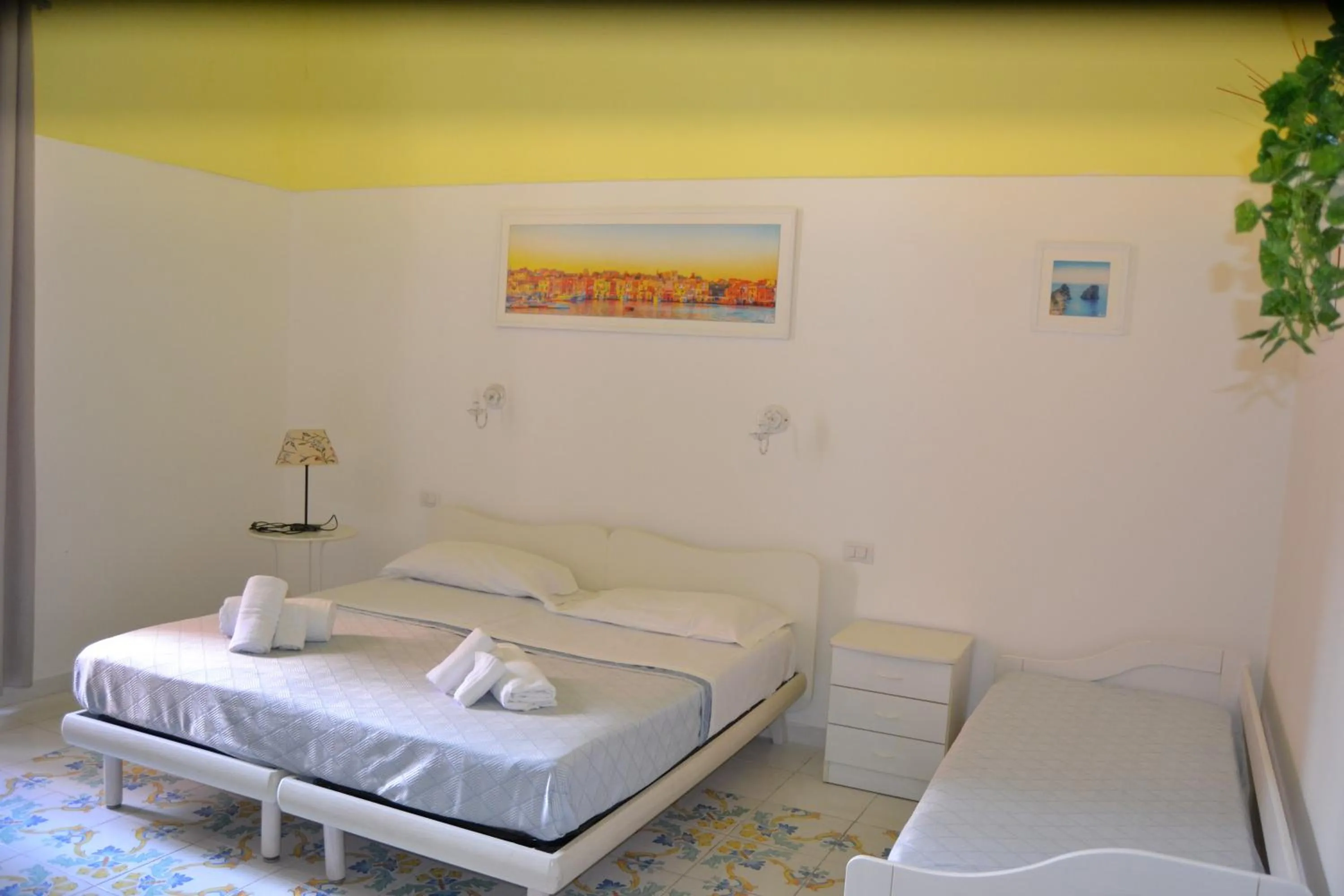Bed in Il Borghetto Apartments & Rooms