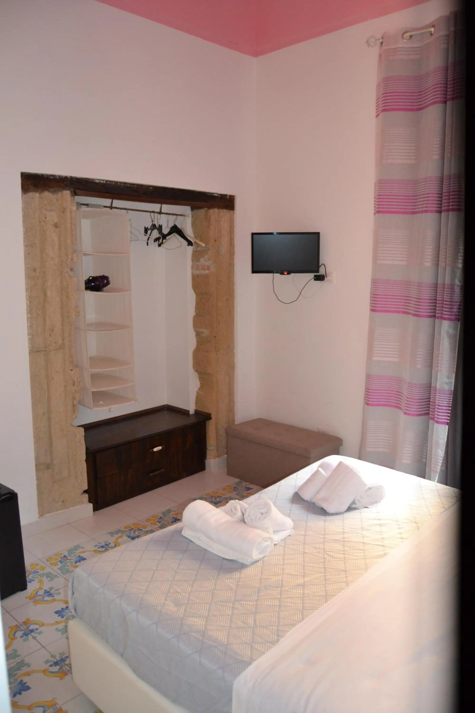 Bed in Il Borghetto Apartments & Rooms