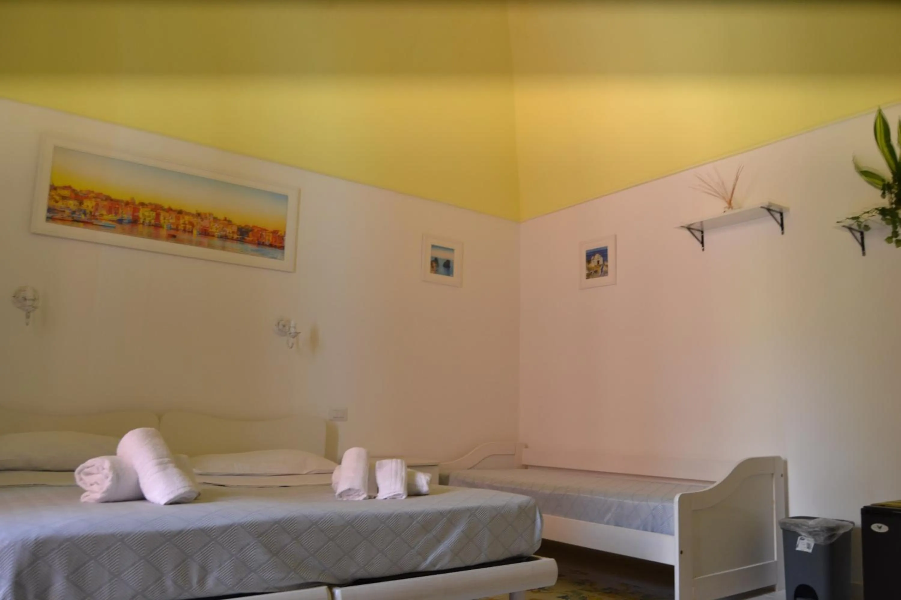 Bed in Il Borghetto Apartments & Rooms