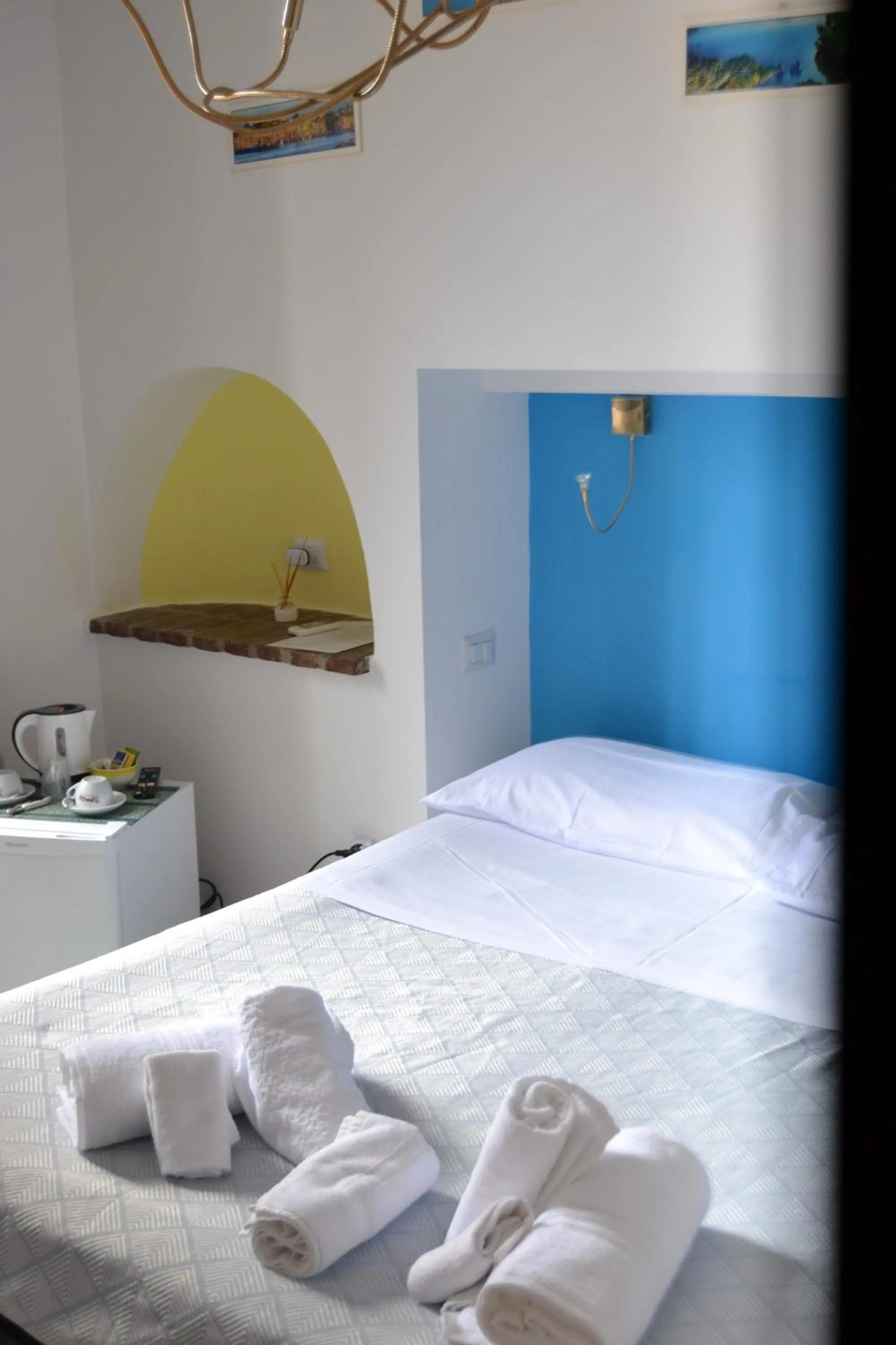 Bed in Il Borghetto Apartments & Rooms