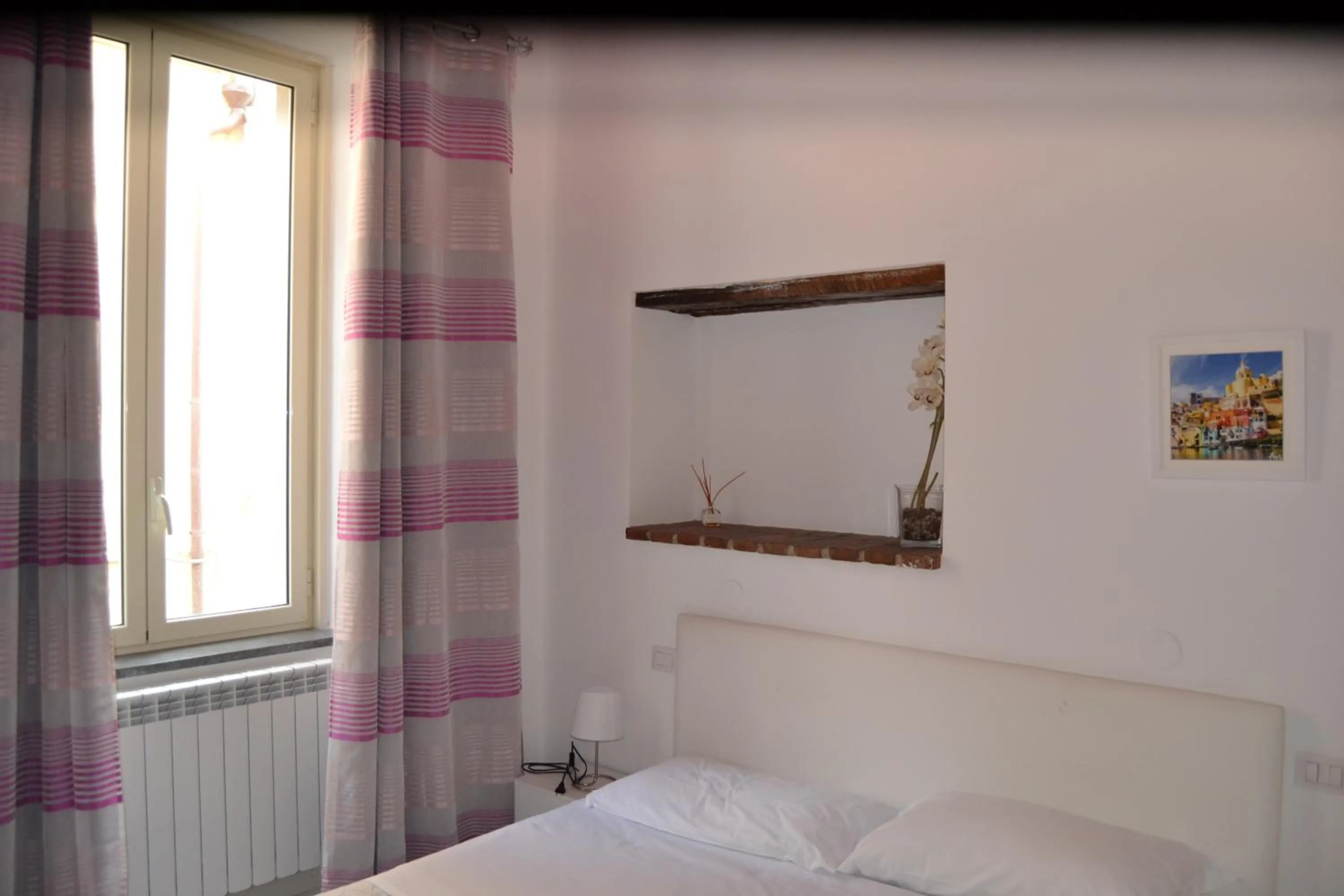 Bed in Il Borghetto Apartments & Rooms