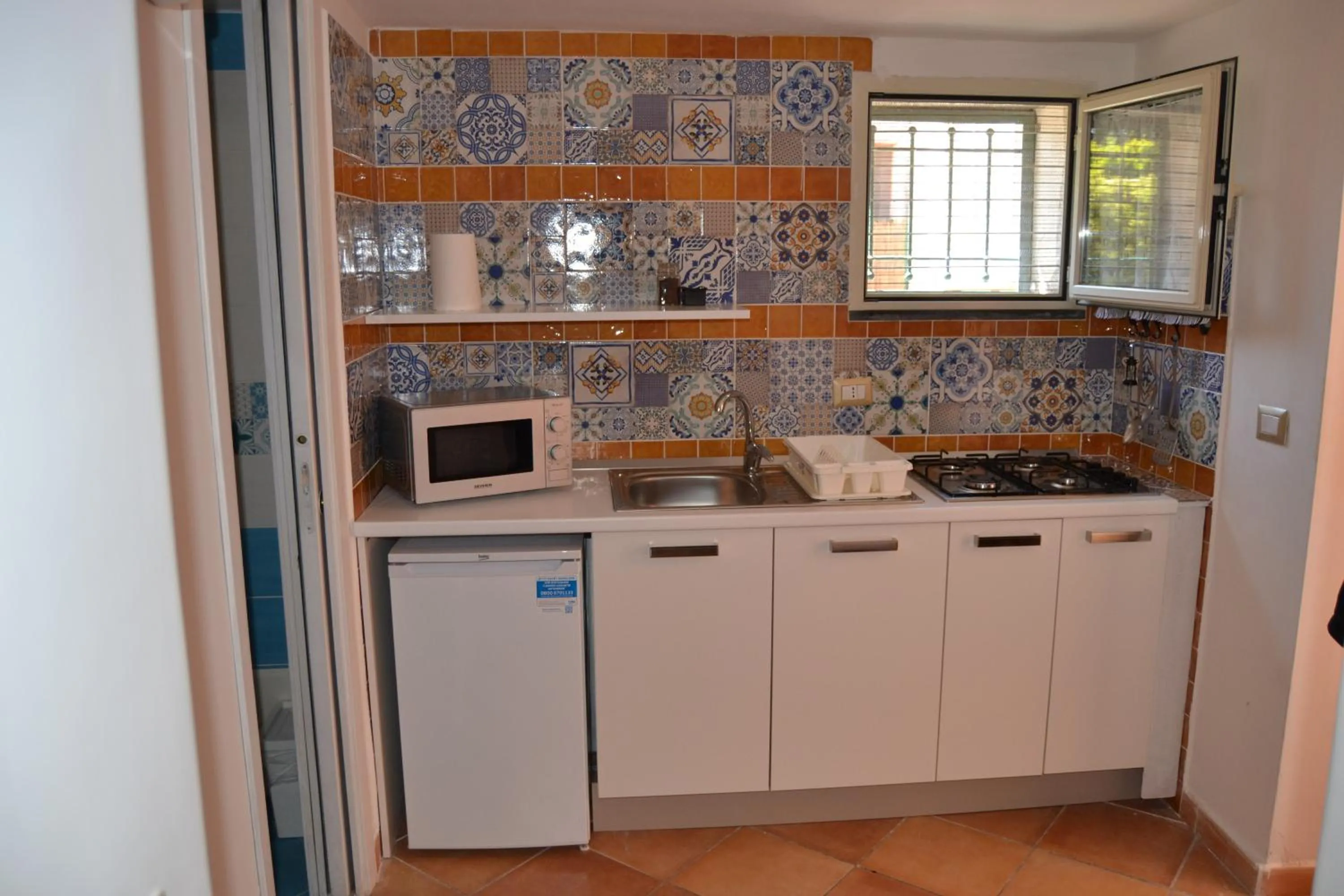 Kitchen or kitchenette in Il Borghetto Apartments & Rooms