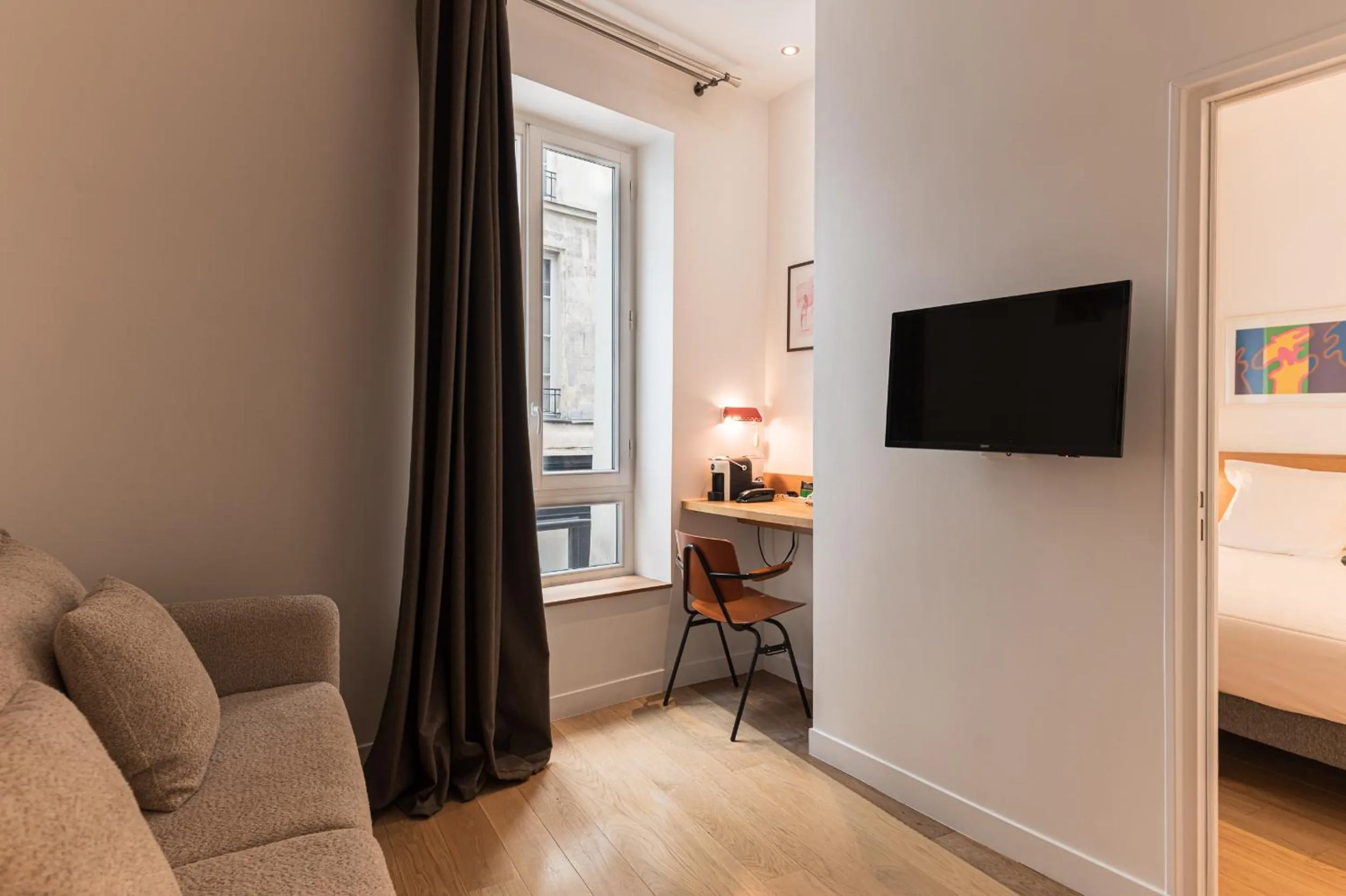 Bed in Hôtel Louvre Richelieu