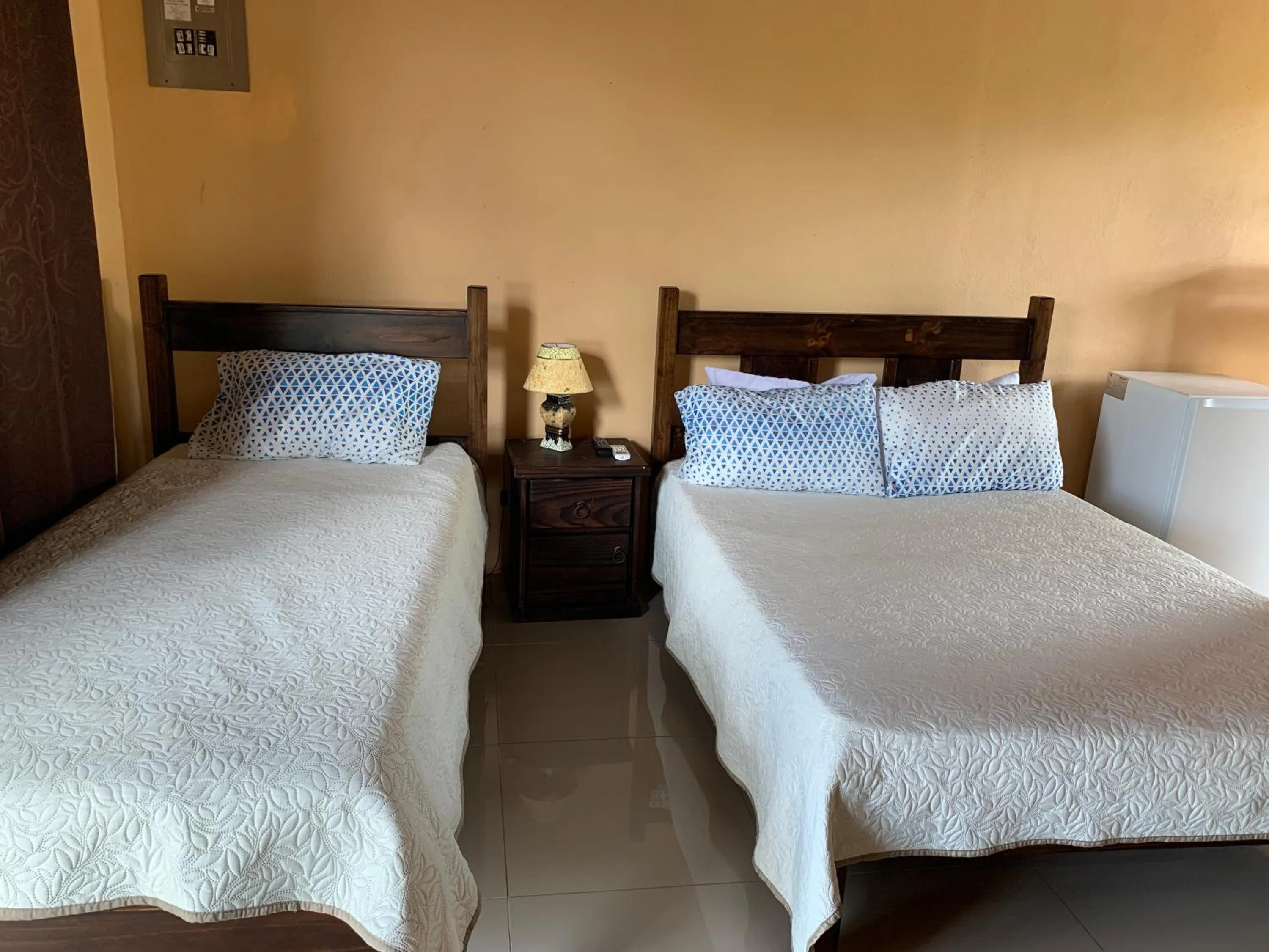 Bed in Aunty Arenal Lodge