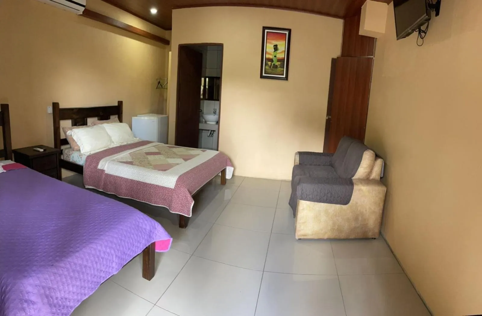 Bed in Aunty Arenal Lodge