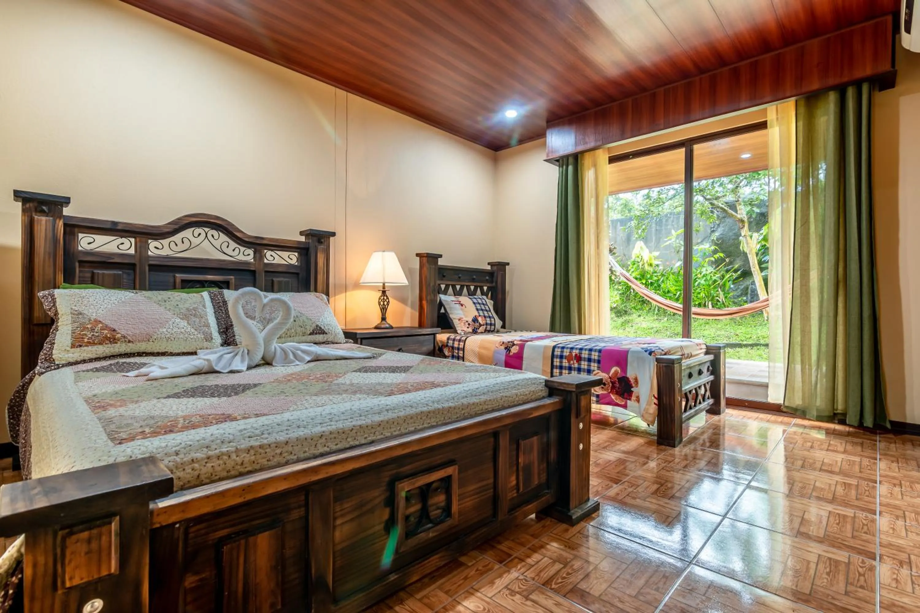 Bed in Aunty Arenal Lodge