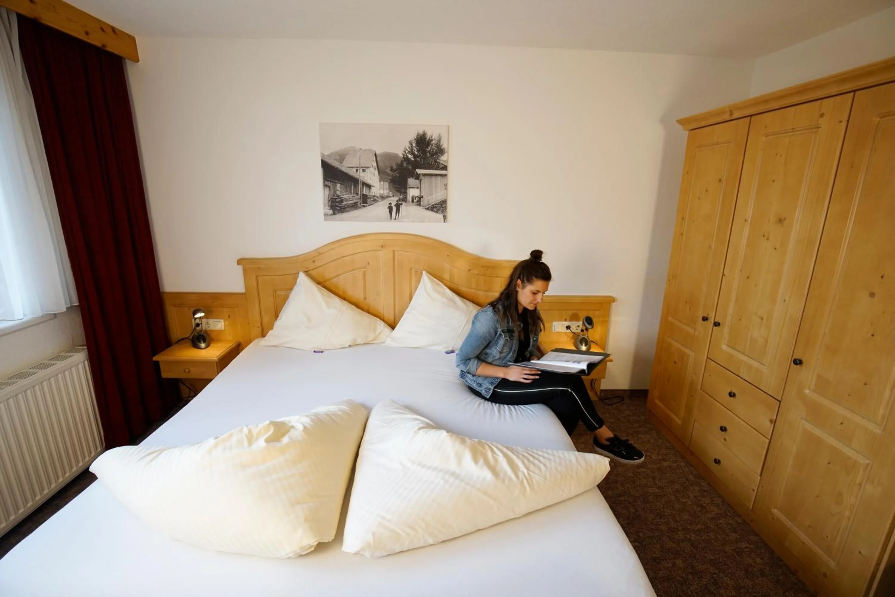 Bedroom, Bed in Alpenstern rooms & suites