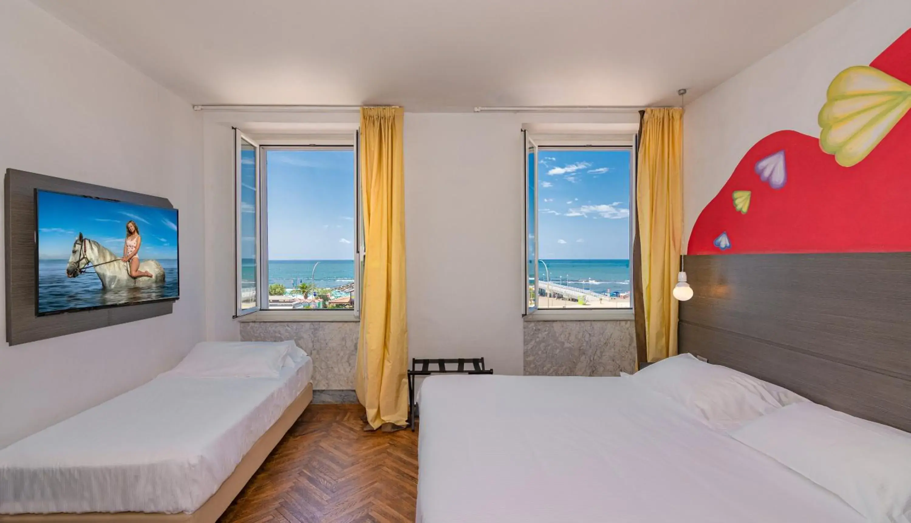 Quadruple Room with Sea View in Hotel Tirreno Quadruple Room with Sea View in Hotel Tirreno