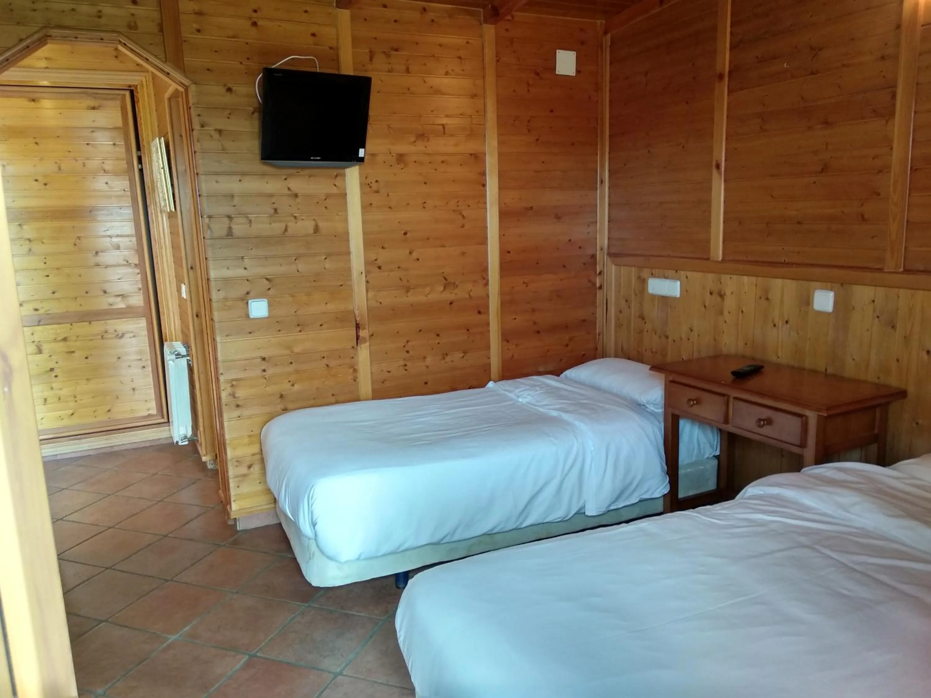 Bed in Hotel Sierra Oriente