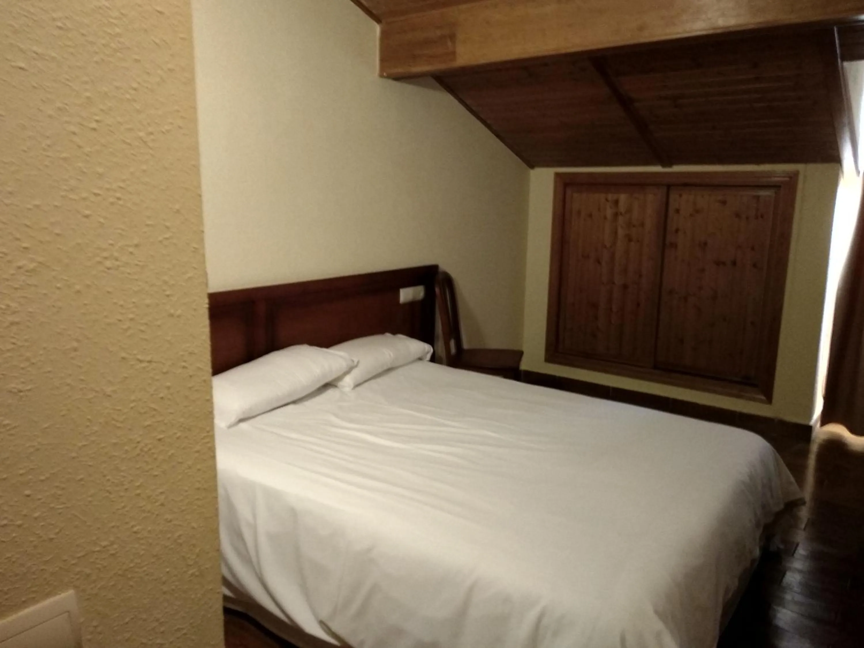 Bed in Hotel Sierra Oriente