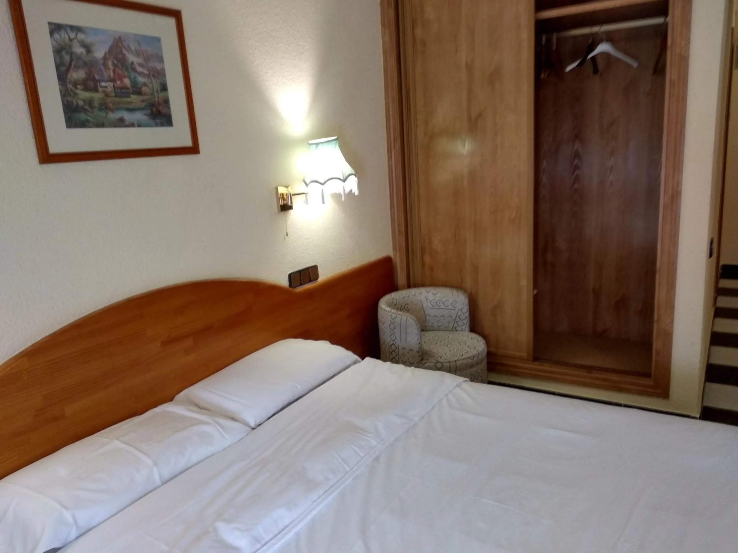 Bed in Hotel Sierra Oriente